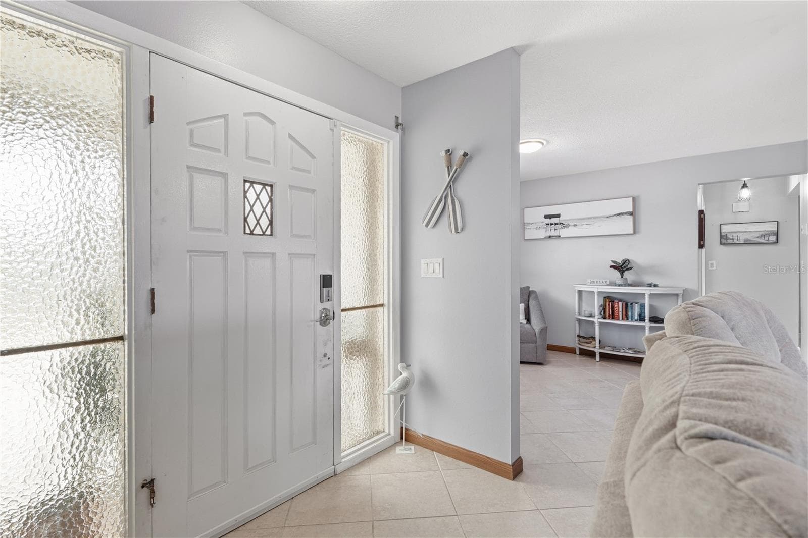 Front Entry Opening Into The Turnkey Furnished Interior - 2284 BROAD RANCH DR, PORT CHARLOTTE
