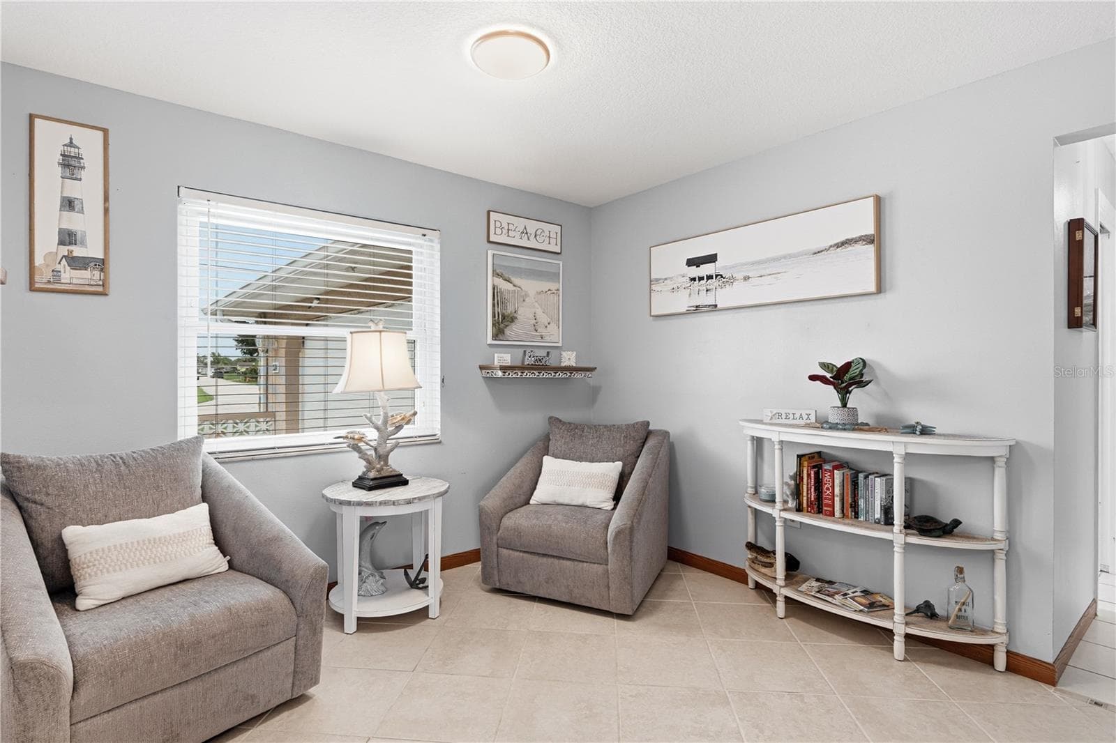 Cozy Sitting Room with Bright Window and Coastal Touches - 2284 BROAD RANCH DR, PORT CHARLOTTE