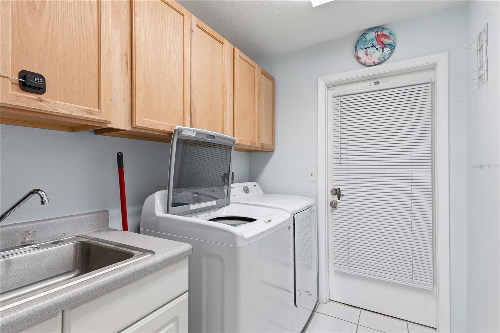 Spacious Laundry Room with Utility Sink and Extra Storage - 2284 BROAD RANCH DR, PORT CHARLOTTE