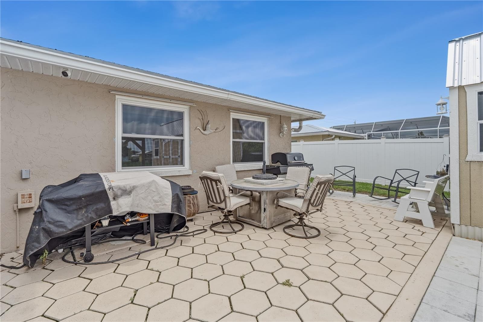 Paver Patio with Outdoor Seating and Grill Area - 2284 BROAD RANCH DR, PORT CHARLOTTE