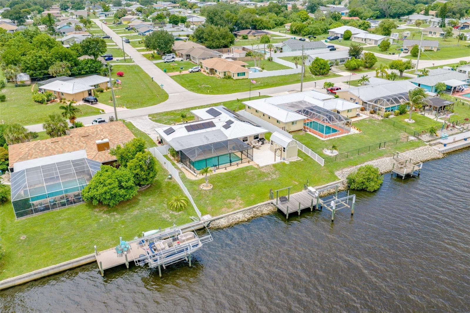 Saltwater Lakefront Living with Solar Savings - 2284 BROAD RANCH DR, PORT CHARLOTTE