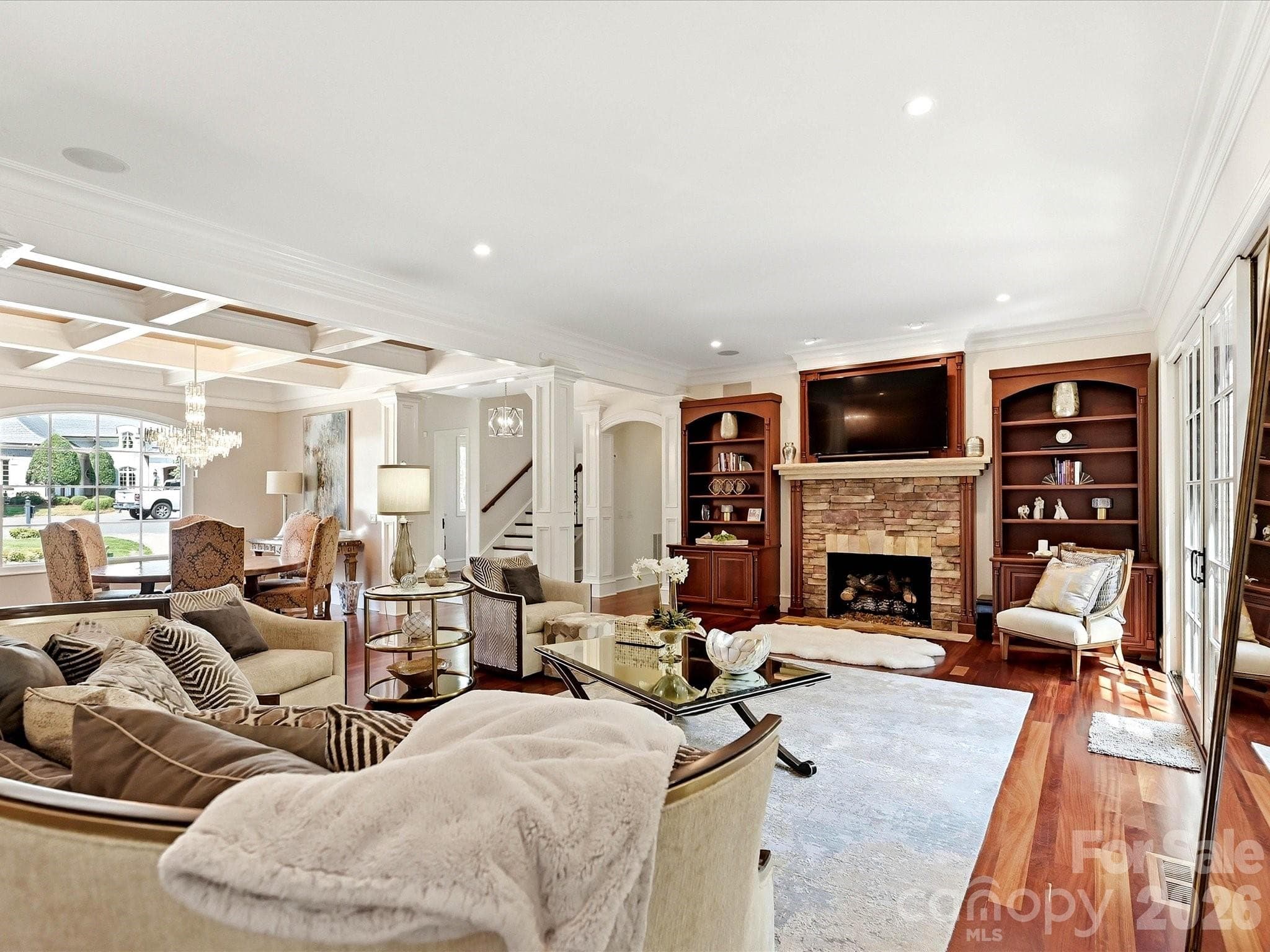 Living Room with beautiful stone fireplace and built-ins - 2320 Brawinal Court, Monroe