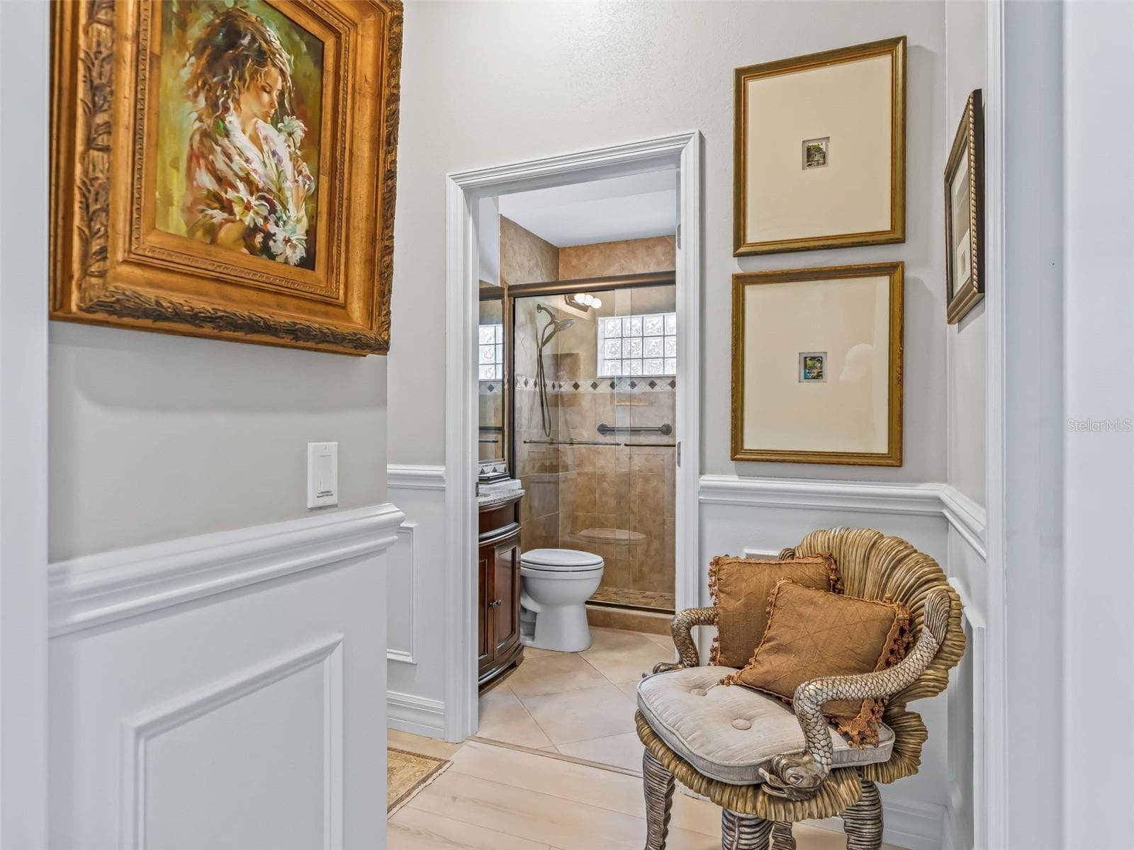 The guest wing is thoughtfully separated from the main living areas, providing added privacy for visiting family and friends and convenient access to the updated guest bathroom. - 714 CIMARRON AVE, THE VILLAGES