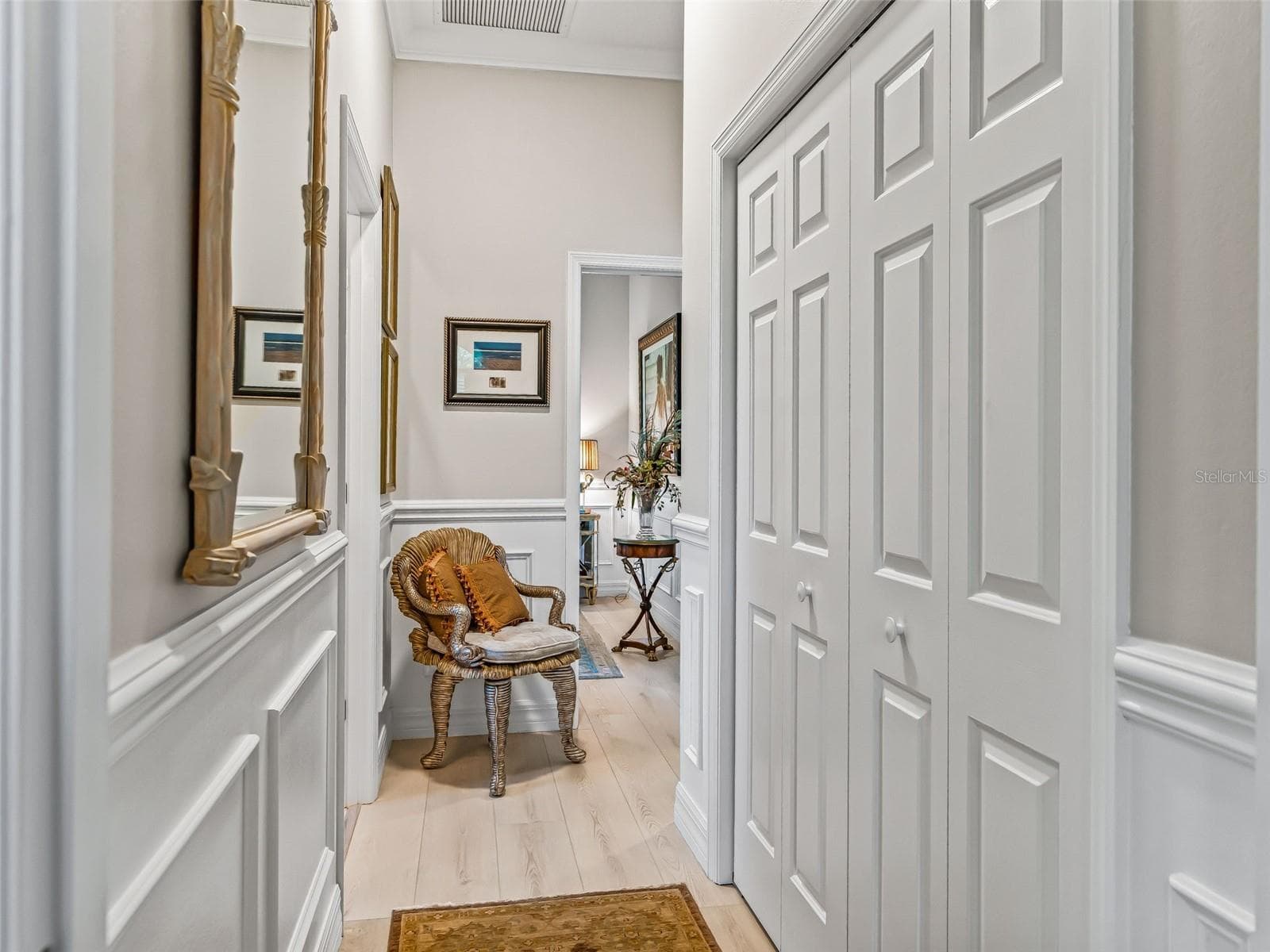 The guest wing is thoughtfully separated from the main living areas and enhanced by wainscoting, decorative trim, and convenient storage. - 714 CIMARRON AVE, THE VILLAGES
