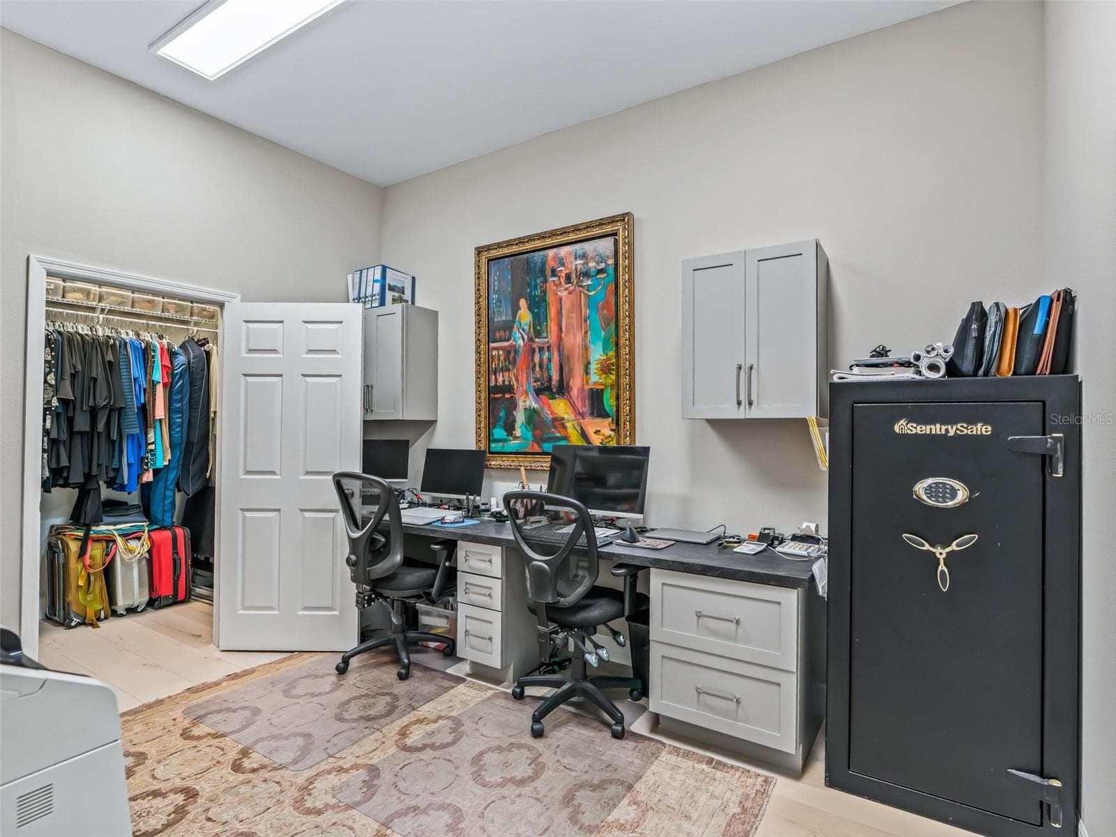 NEW 2024! Tucked beyond the butler’s pantry is a private hideaway office with generous workspace, built-in storage, and room for files, equipment, and everyday organization. - 714 CIMARRON AVE, THE VILLAGES