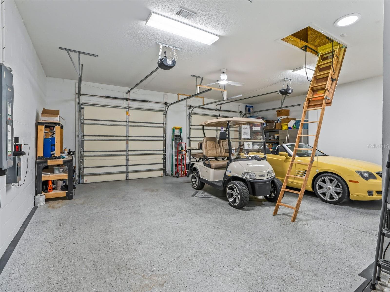 The expansive garage is under heat and air and offers room for large vehicles plus golf carts, providing exceptional flexibility beyond the home’s stated living square footage. - 714 CIMARRON AVE, THE VILLAGES