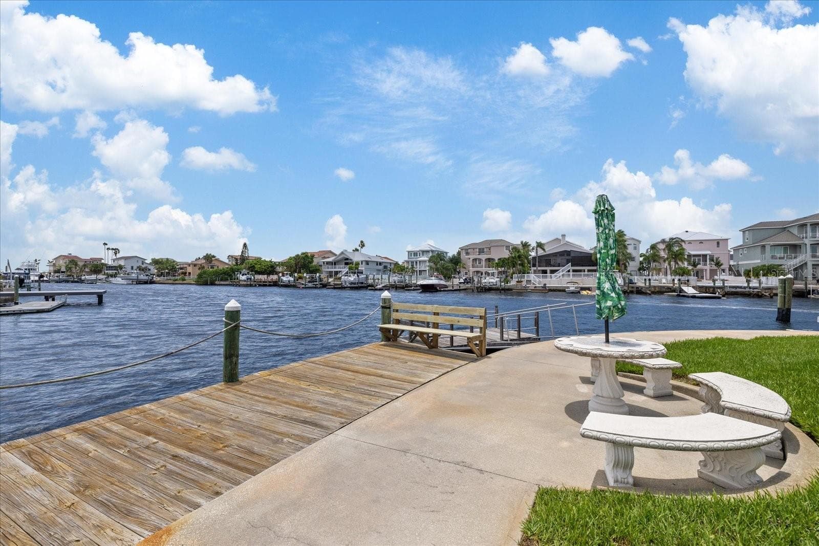 expansive stationary dock and built in concrete table and seating - 3154 TRIDENT TER, NEW PORT RICHEY