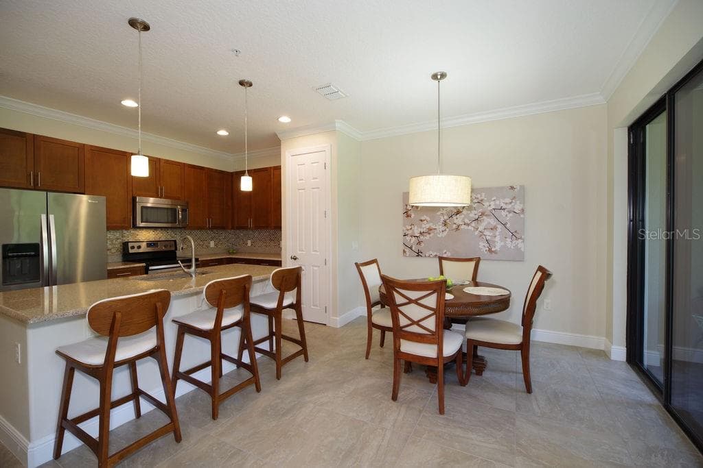 DINING ROOM AND KITCHEN VIEWS - 1541 CORKERY CT #1541, WINTER SPRINGS