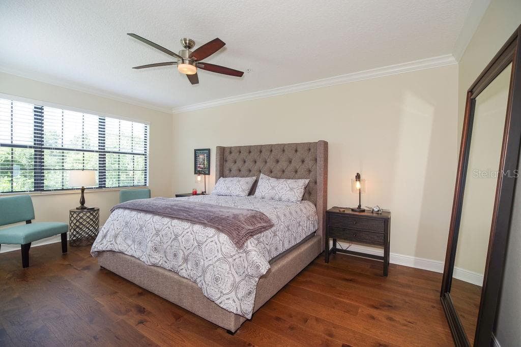PRIMARY BEDROOM OVERLOOKING CONSERVATION, GOLF AND WATER - 1541 CORKERY CT #1541, WINTER SPRINGS