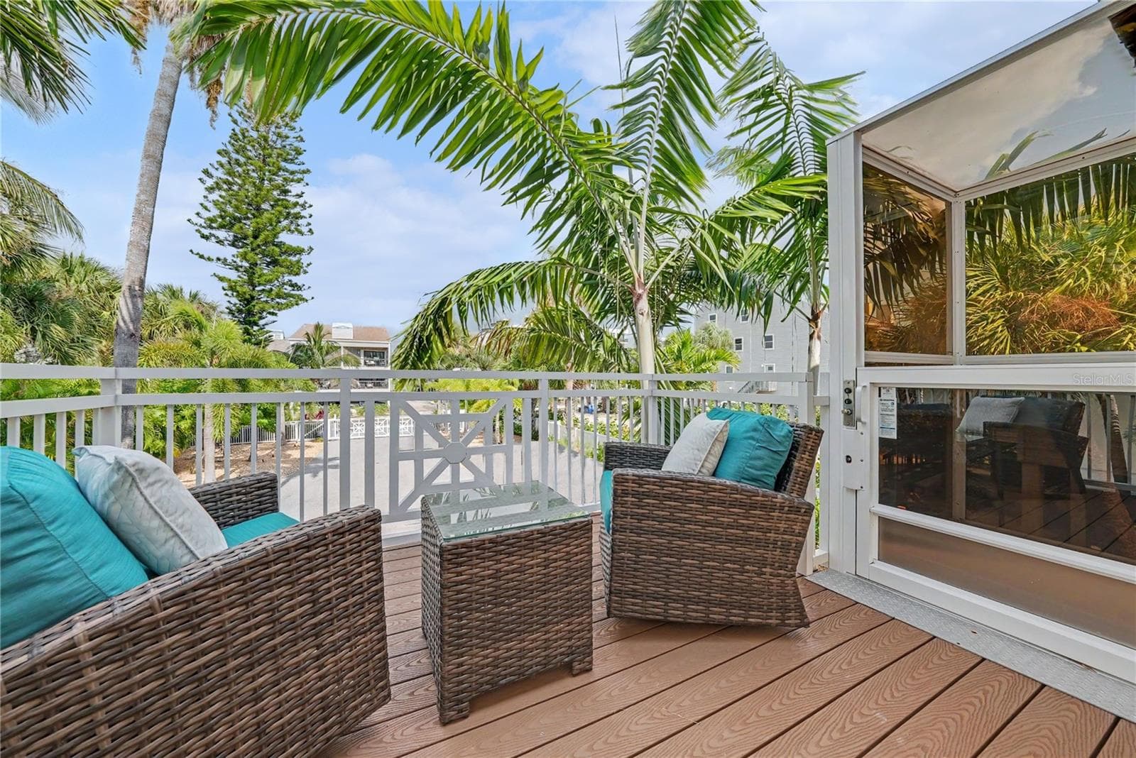 The perfect spot for your morning coffee and a good book. Partial views of the Intracoastal and sunrises. - 19936 GULF BLVD, INDIAN SHORES