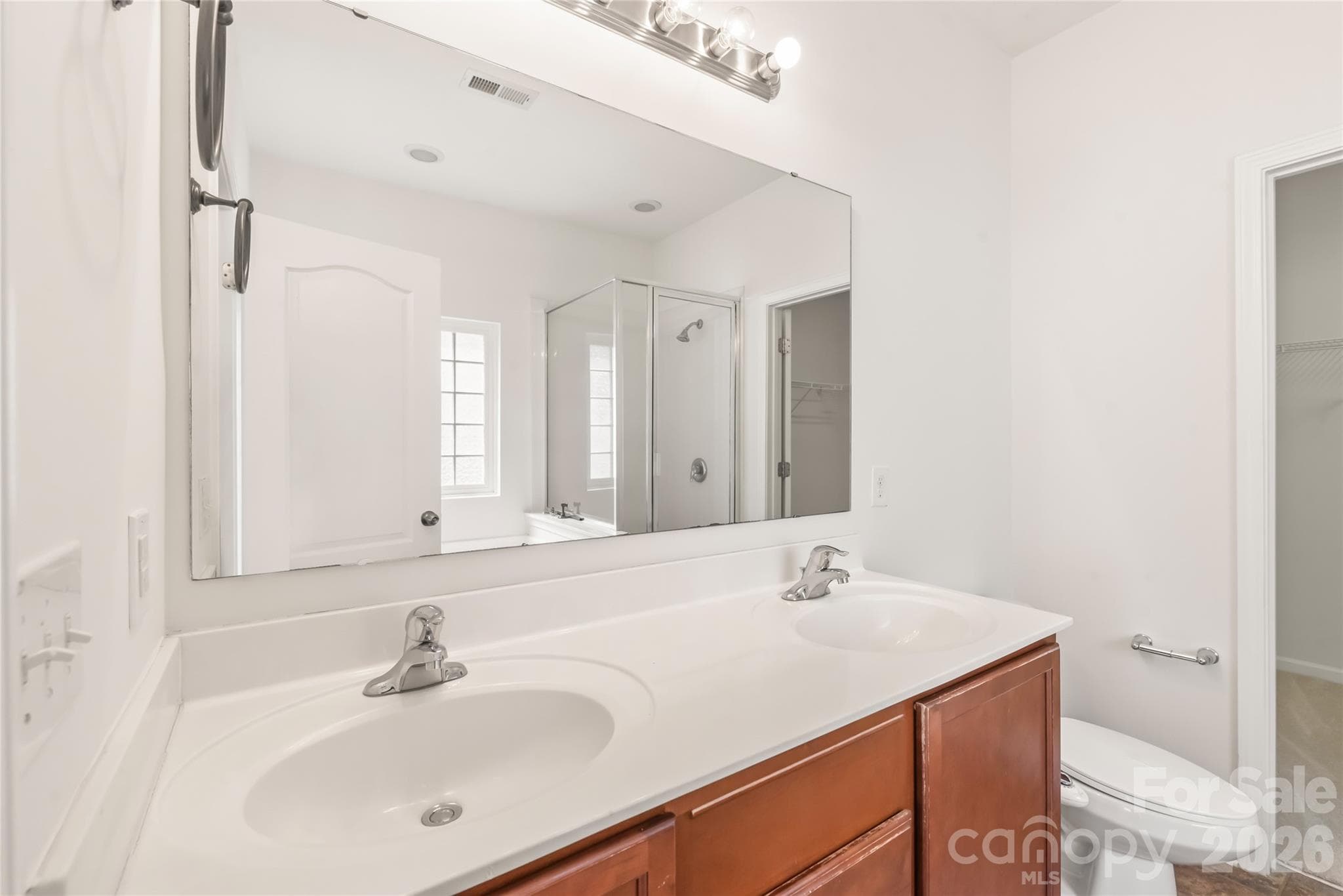 *Note On-suite bathroom has middle drawer missing- the photographer did a "virtual" drawer face in photo. - 8411 Romana Red Lane, Charlotte