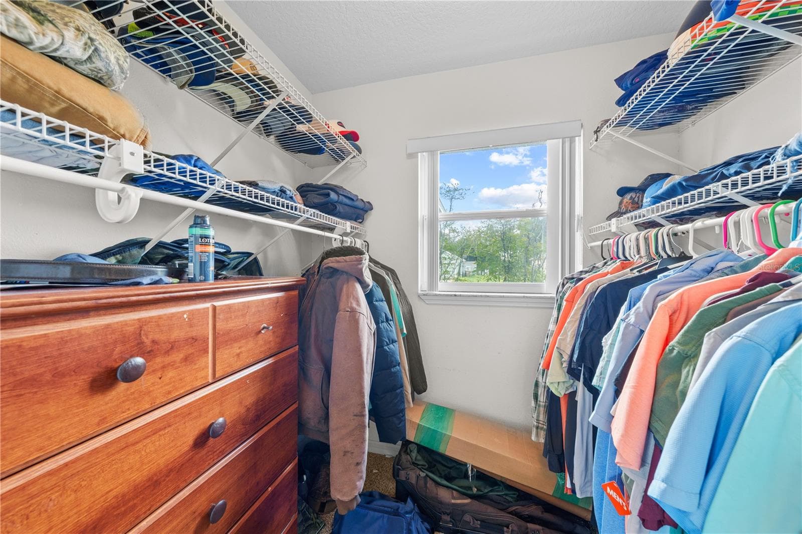 primary closet - 4865 MEADOW DR, ST CLOUD