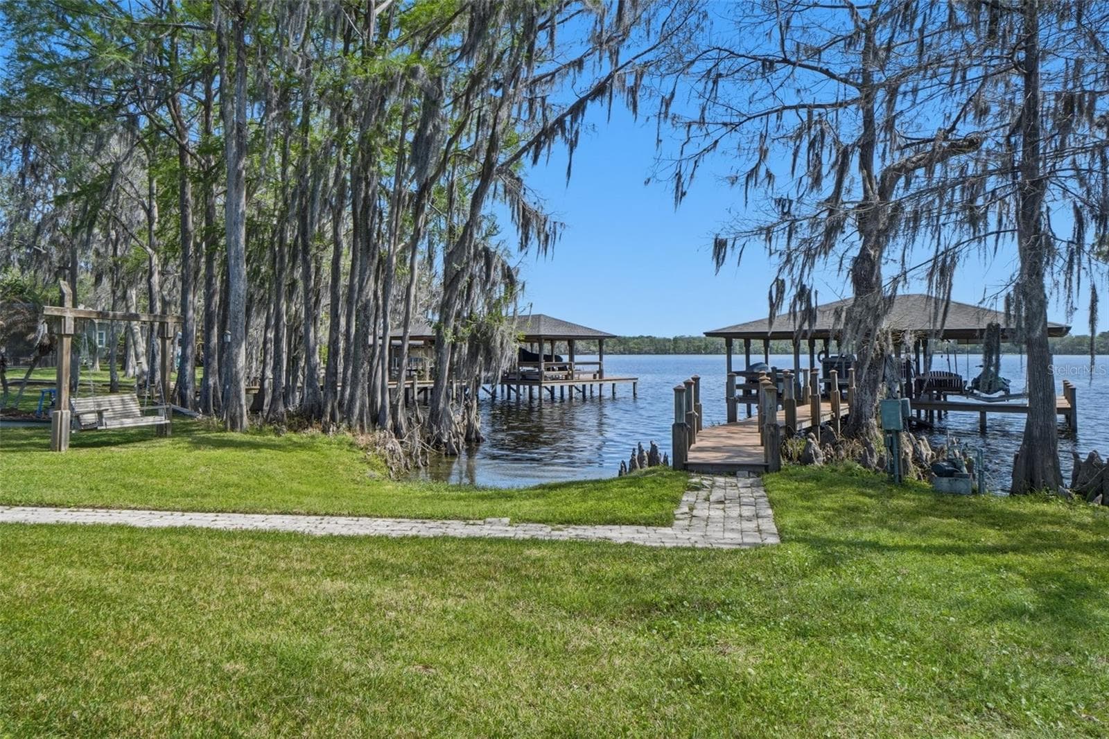 Backyard with lake views - 834 MILLSHORE DR, CHULUOTA
