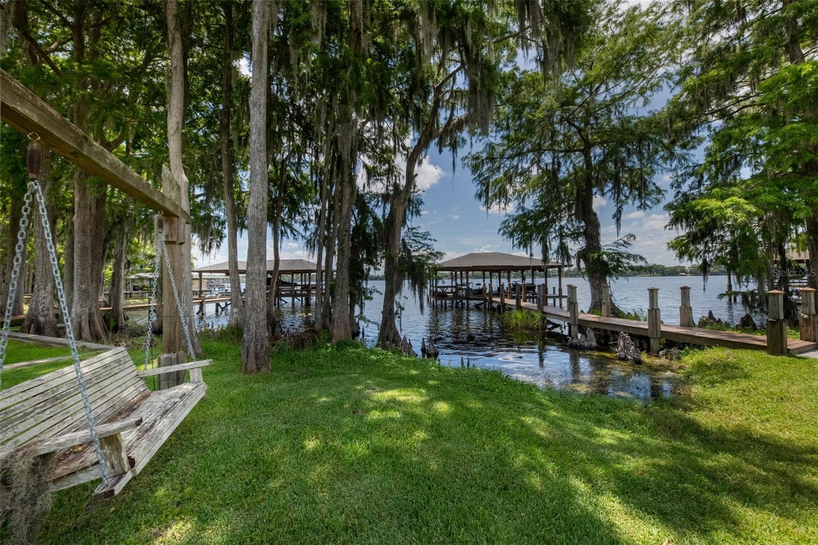 Views of boat dock and lake - 834 MILLSHORE DR, CHULUOTA