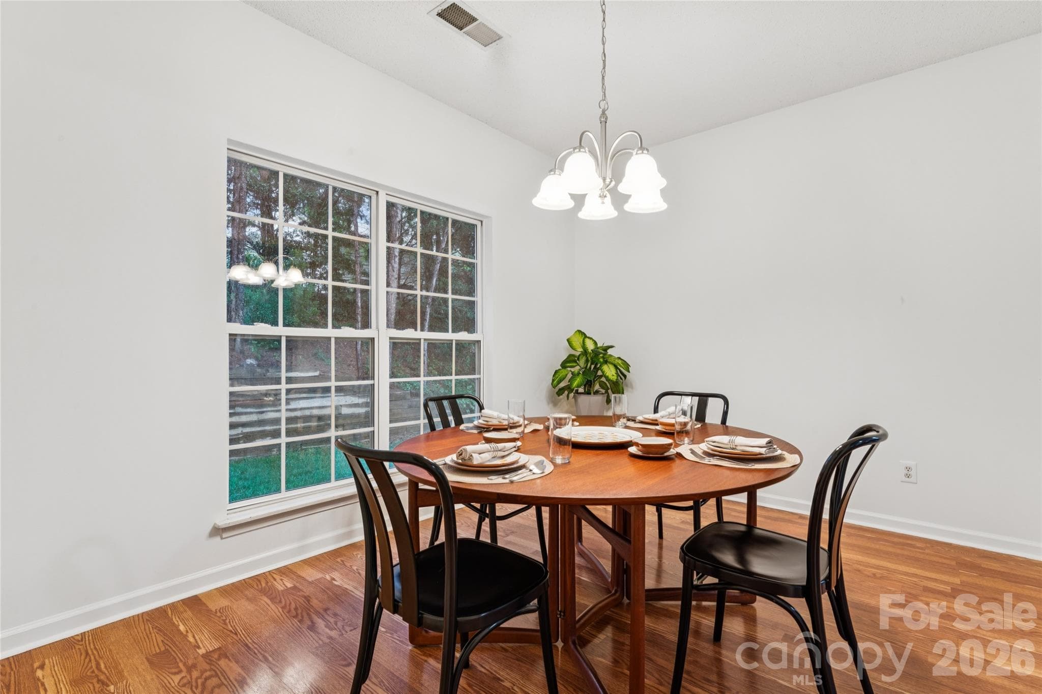 dining room with TONS of natural light - 5645 Winslow Avenue NW, Concord