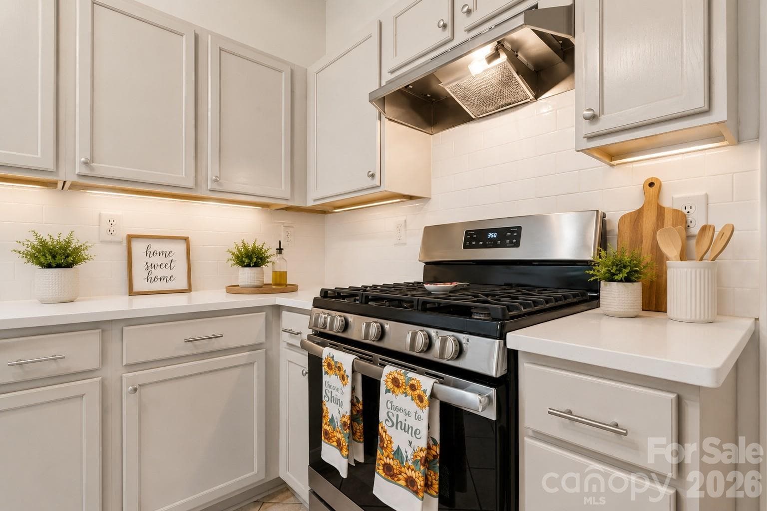updated kitchen with gas range - 5645 Winslow Avenue NW, Concord