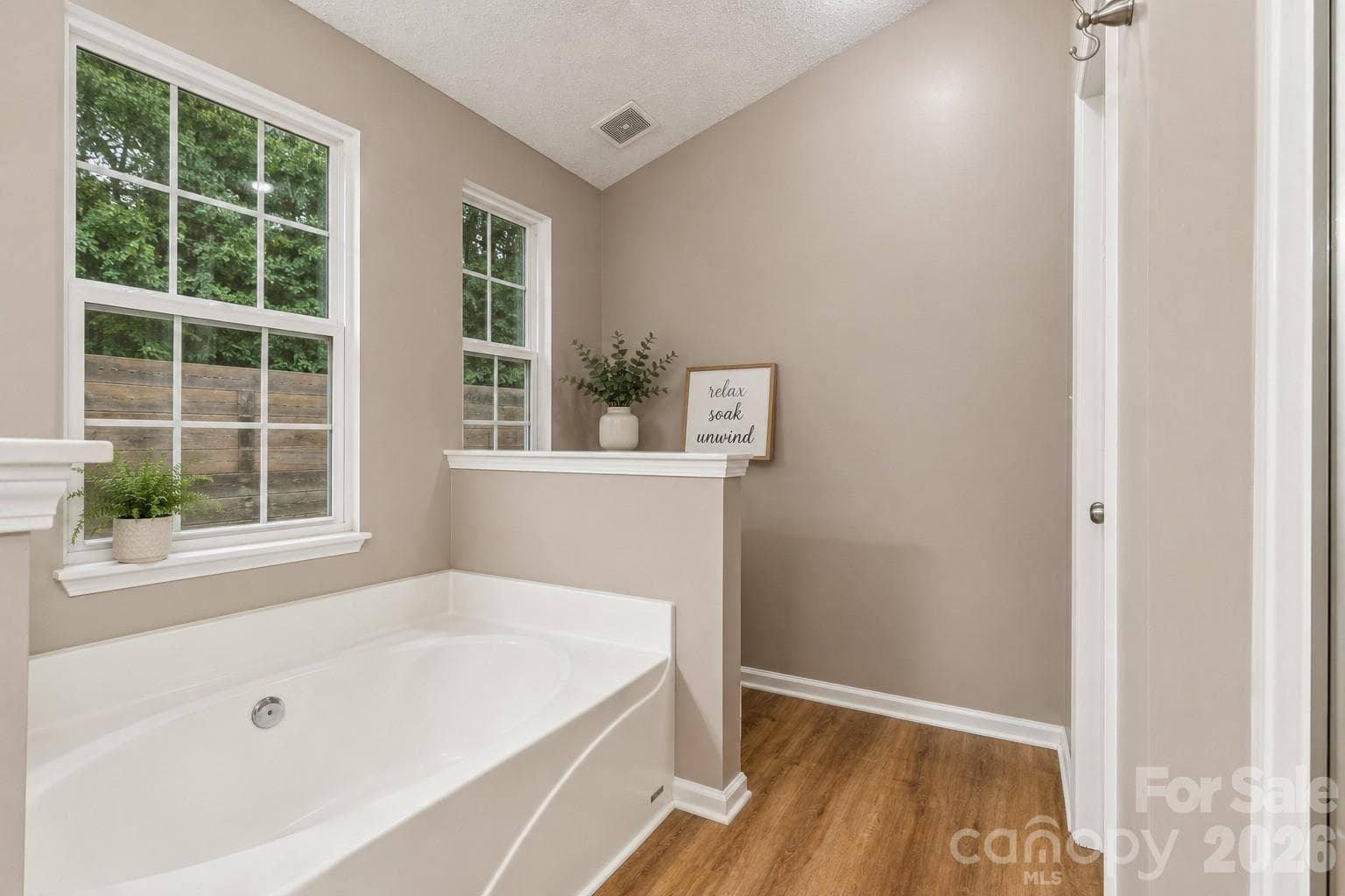 primary en suite bathroom with soaking tub - 5645 Winslow Avenue NW, Concord