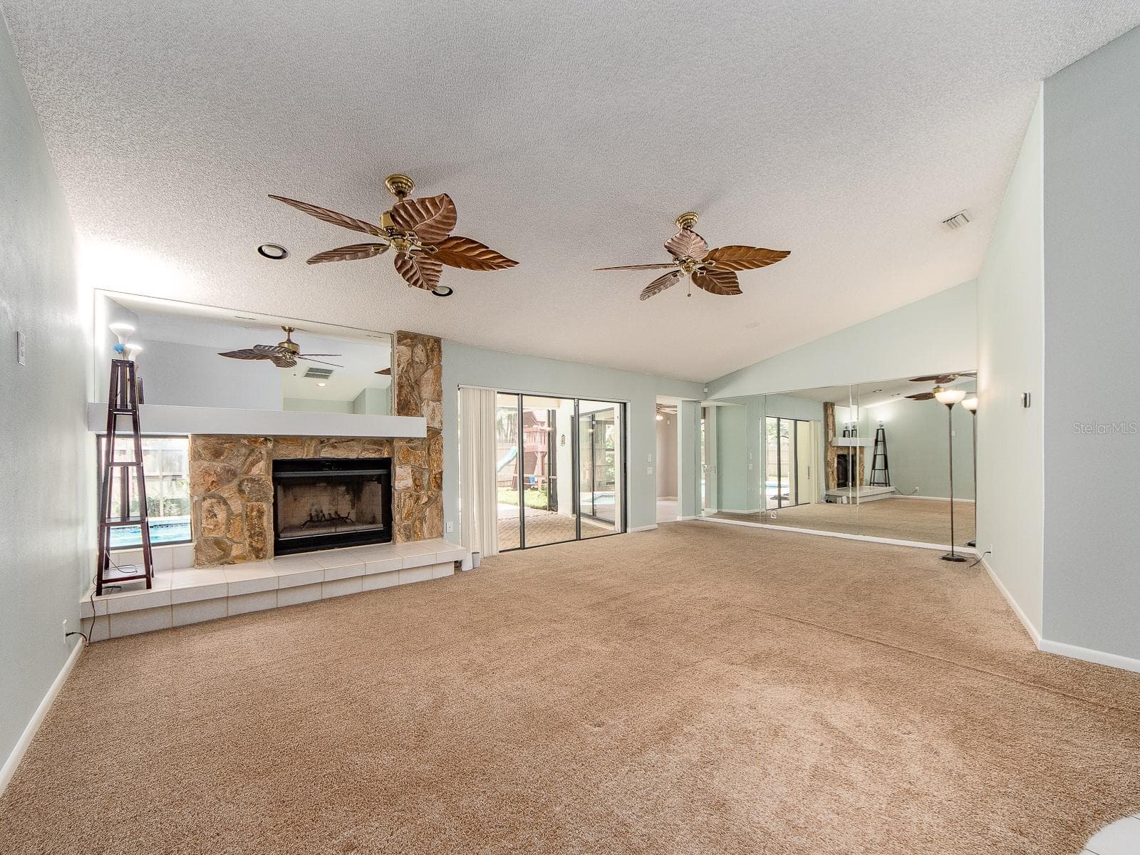 Great room with wood burning fire place - 1612 MIDNIGHT PASS WAY, CLEARWATER