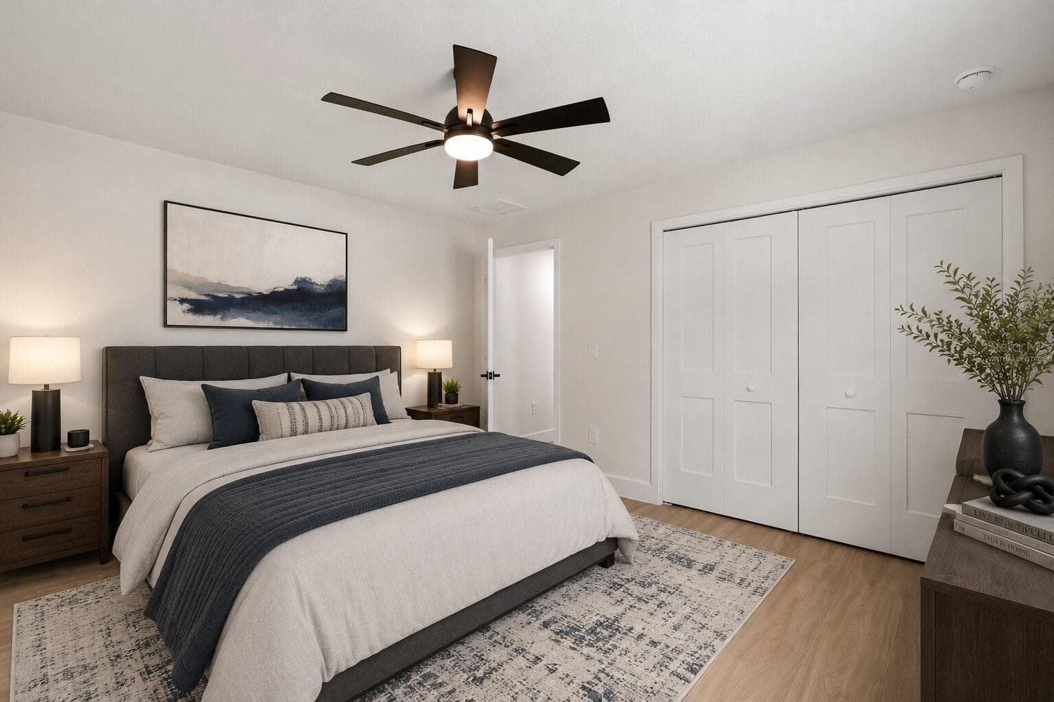 Virtually staged secondary  bedroom showcasing its spacious layout and versatility, offering the perfect space for guests or family. - 39251 COUNTY ROAD 439, UMATILLA