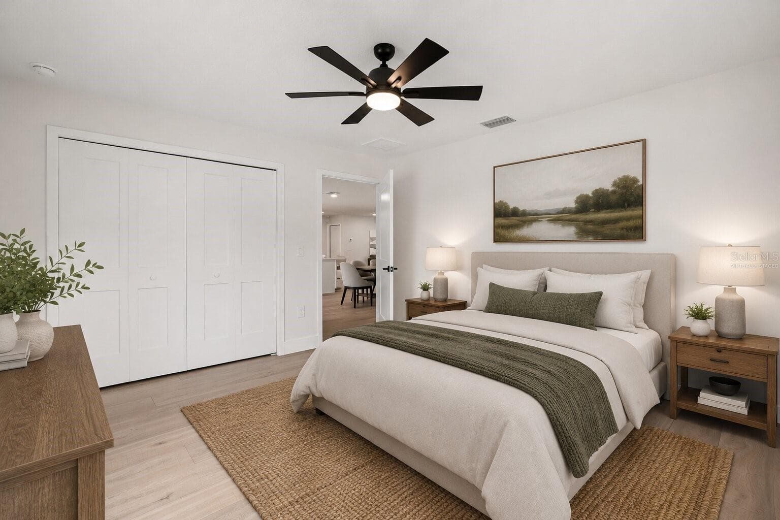 Virtually staged third bedroom showcasing its spacious layout and versatility, perfect for a growing family. - 39251 COUNTY ROAD 439, UMATILLA