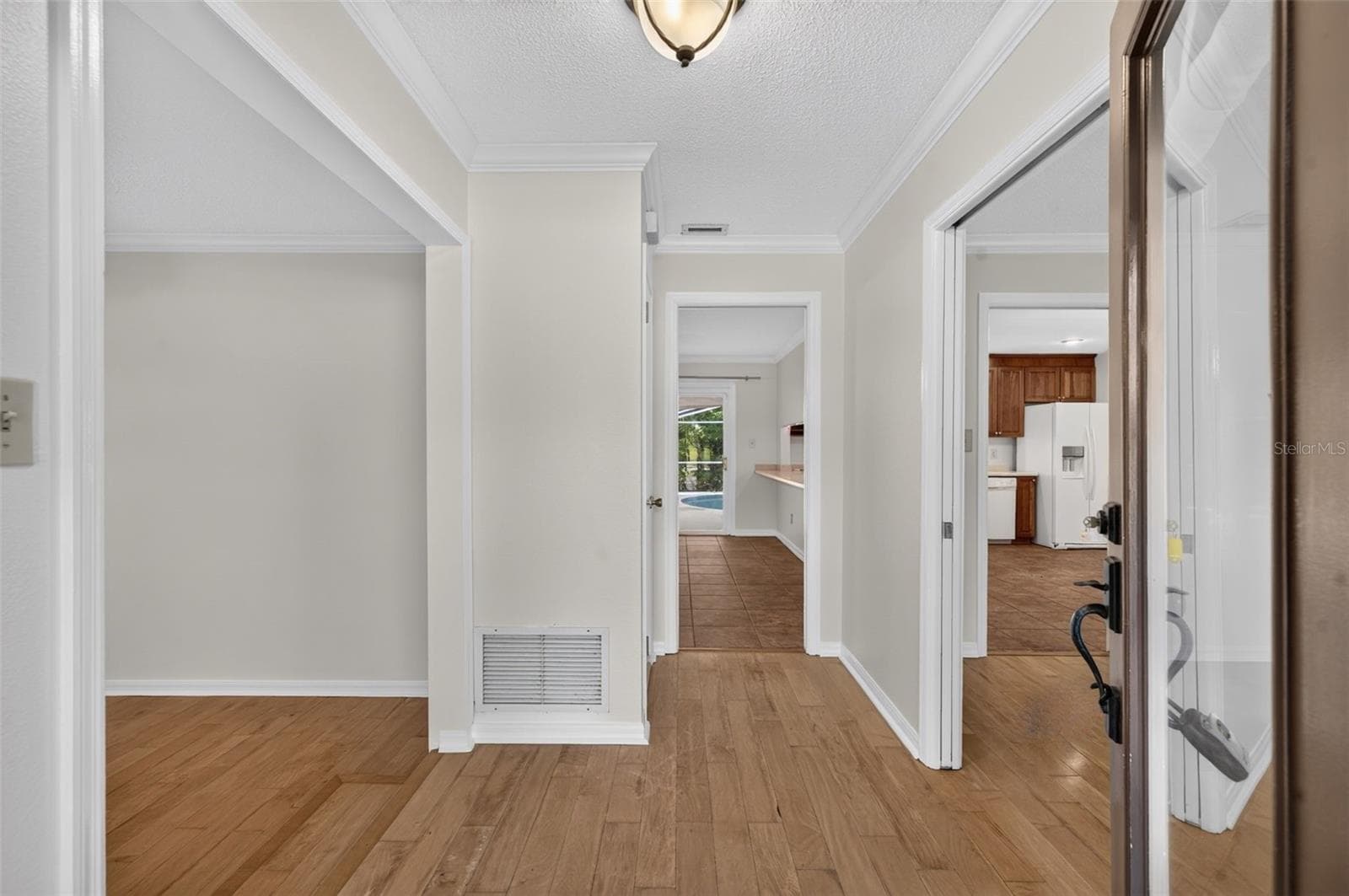 Foyer with living room on left and dining room on the right - 2051 DYAN WAY, MAITLAND