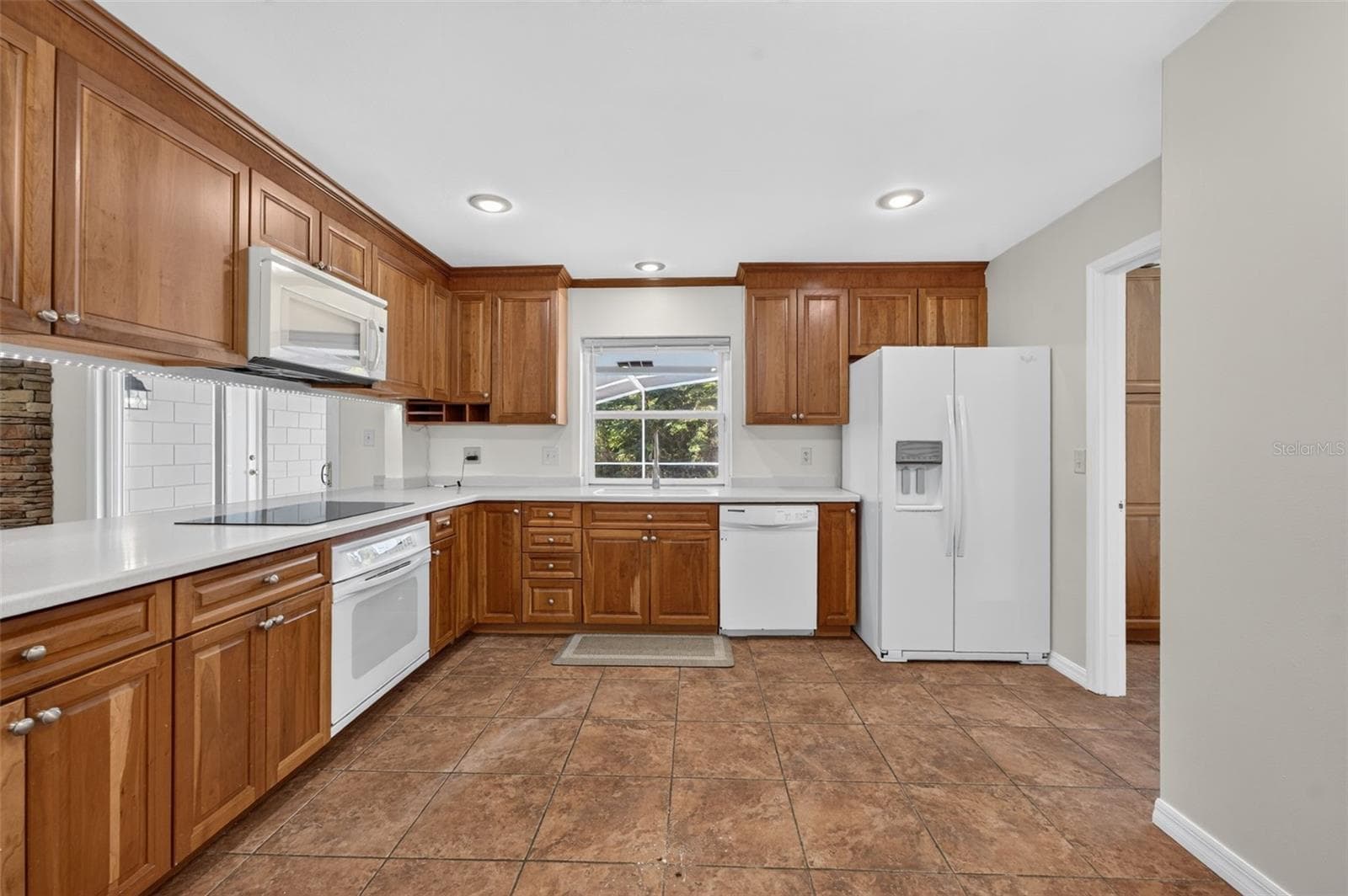 Kitchen also overlooks the pool - 2051 DYAN WAY, MAITLAND