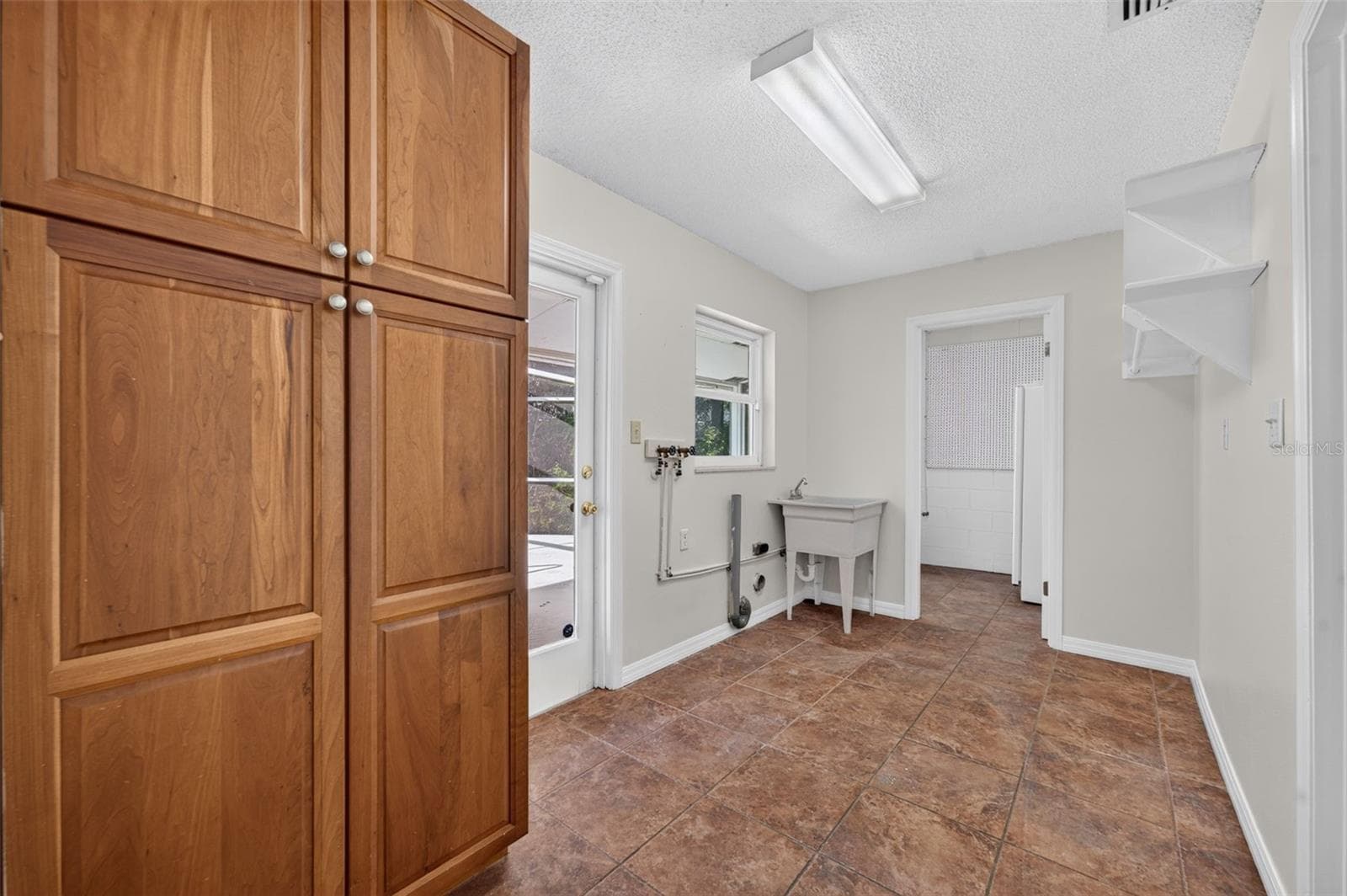 Inside laundry with storage - 2051 DYAN WAY, MAITLAND
