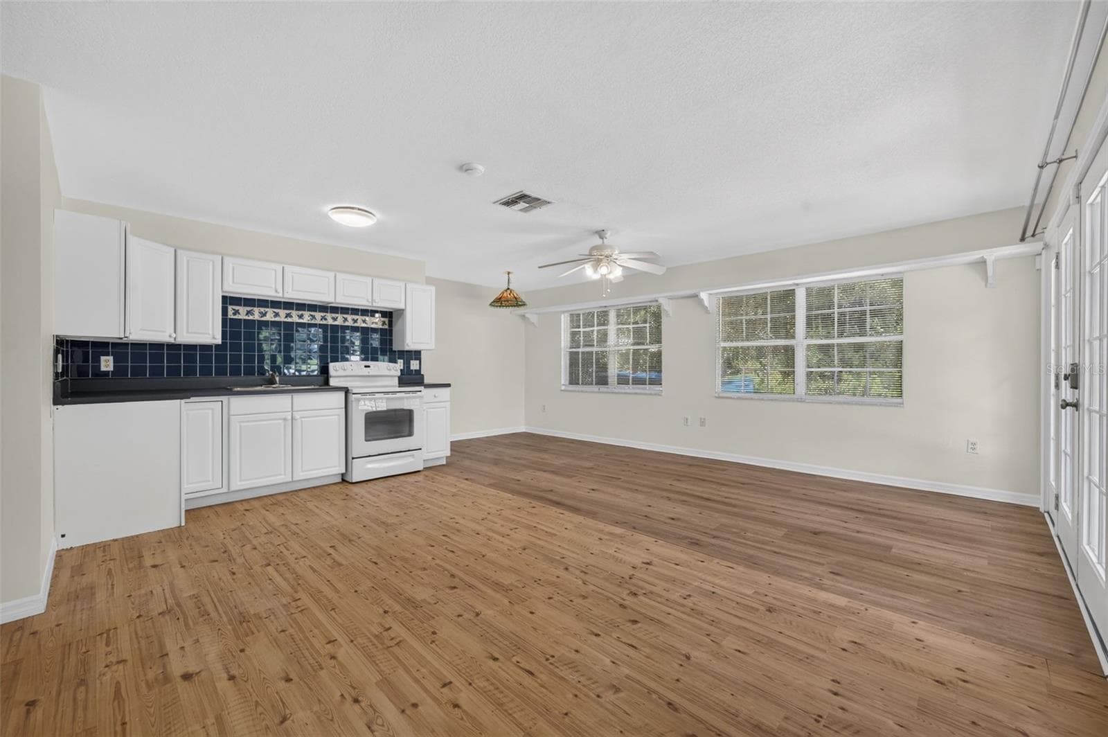 Living room, eat-in space space and kitchenette in in-law suite - 2051 DYAN WAY, MAITLAND