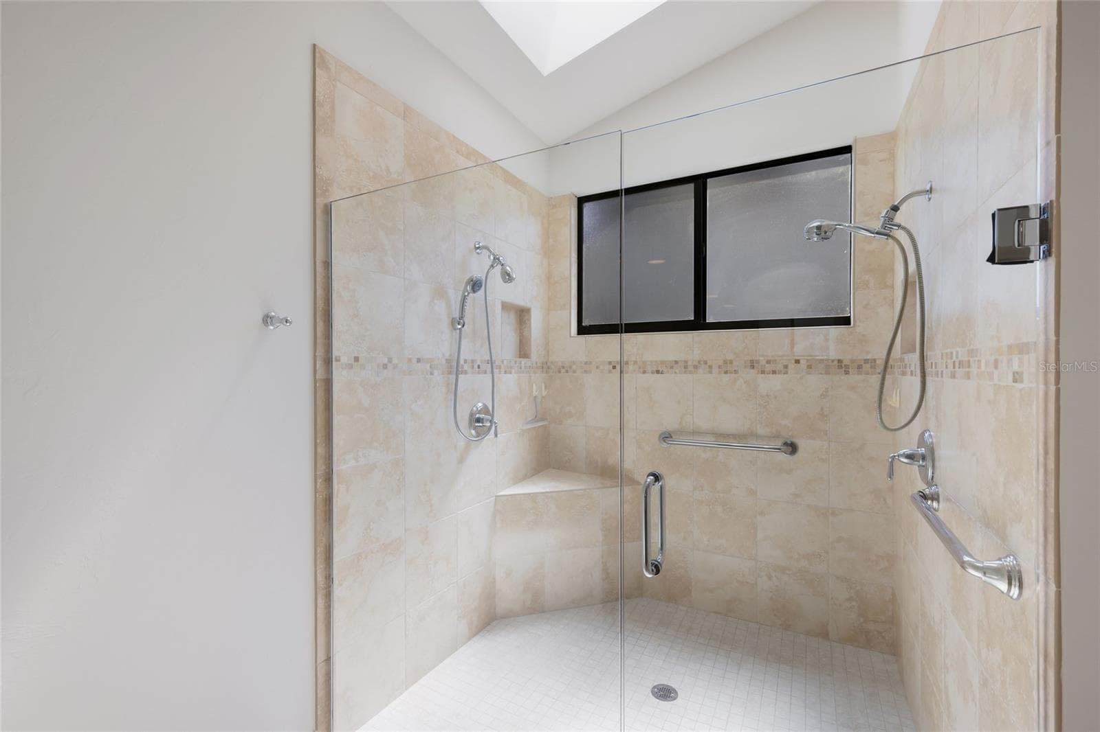 Updated walk-in shower primary bathroom. - 851 FAULKWOOD CT, SARASOTA