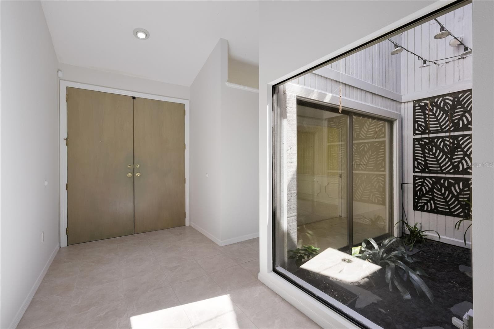 View of front doors with atrium. - 851 FAULKWOOD CT, SARASOTA