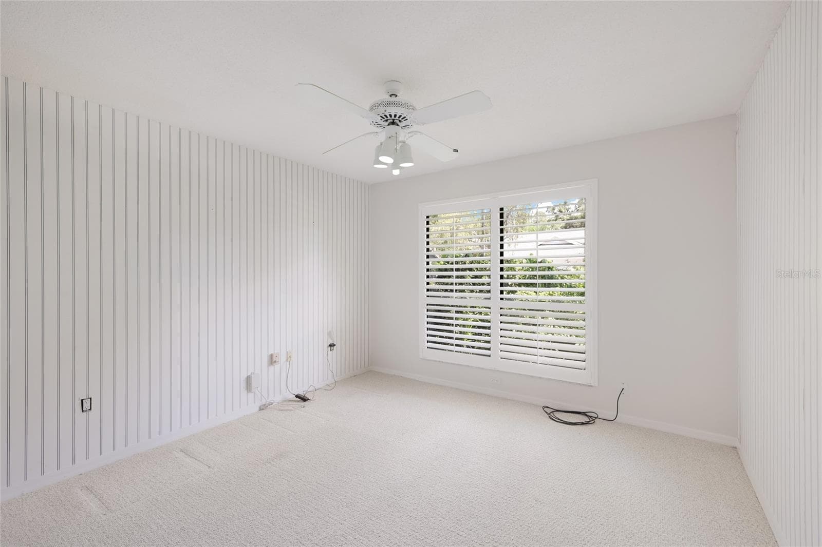 Bedroom 2 with built in closet. - 851 FAULKWOOD CT, SARASOTA