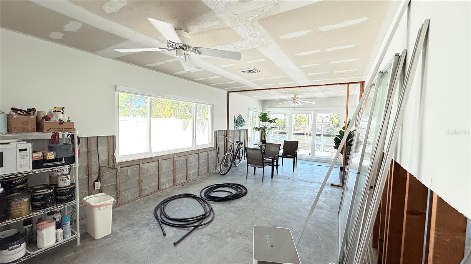 Living area with large new windows and sliding door with lots of natural light - 420 63RD ST #420A, HOLMES BEACH