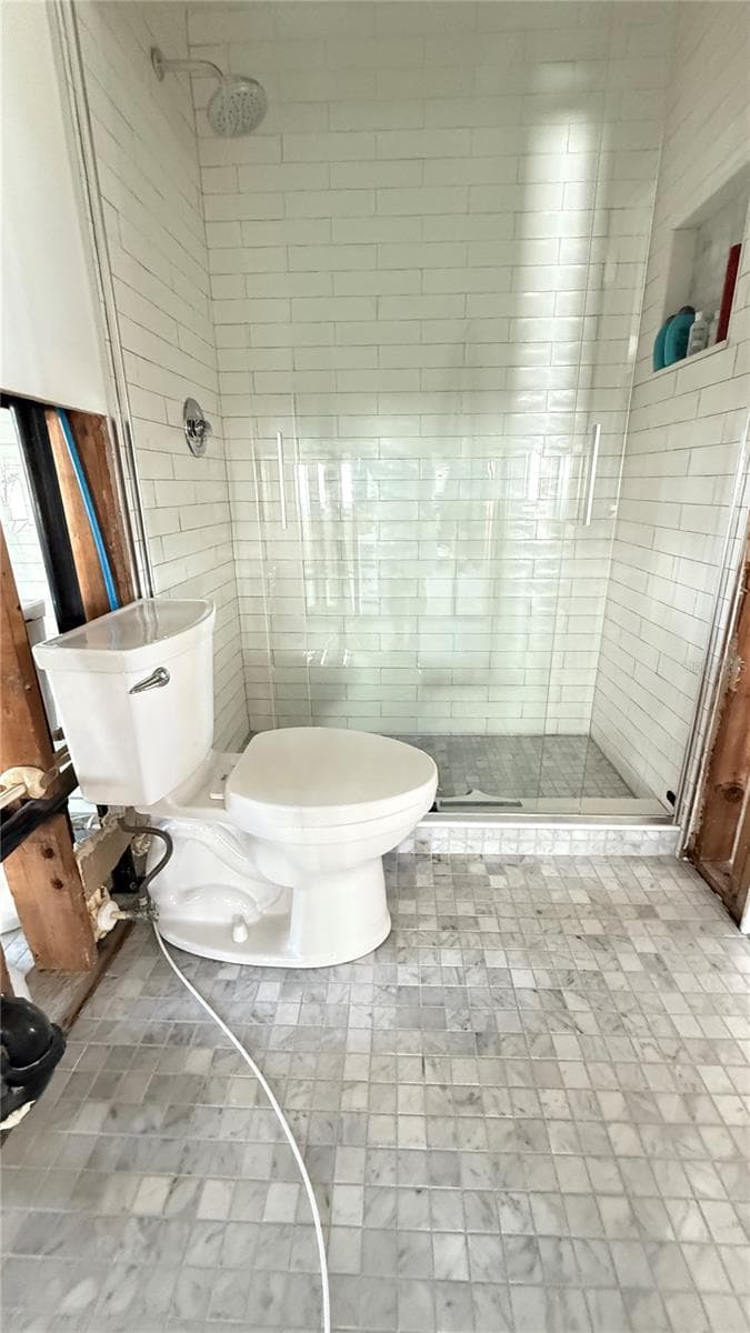 Ensuite bathroom to street side bedroom. Bathrooms were remodeled prior to the storm. - 420 63RD ST #420A, HOLMES BEACH