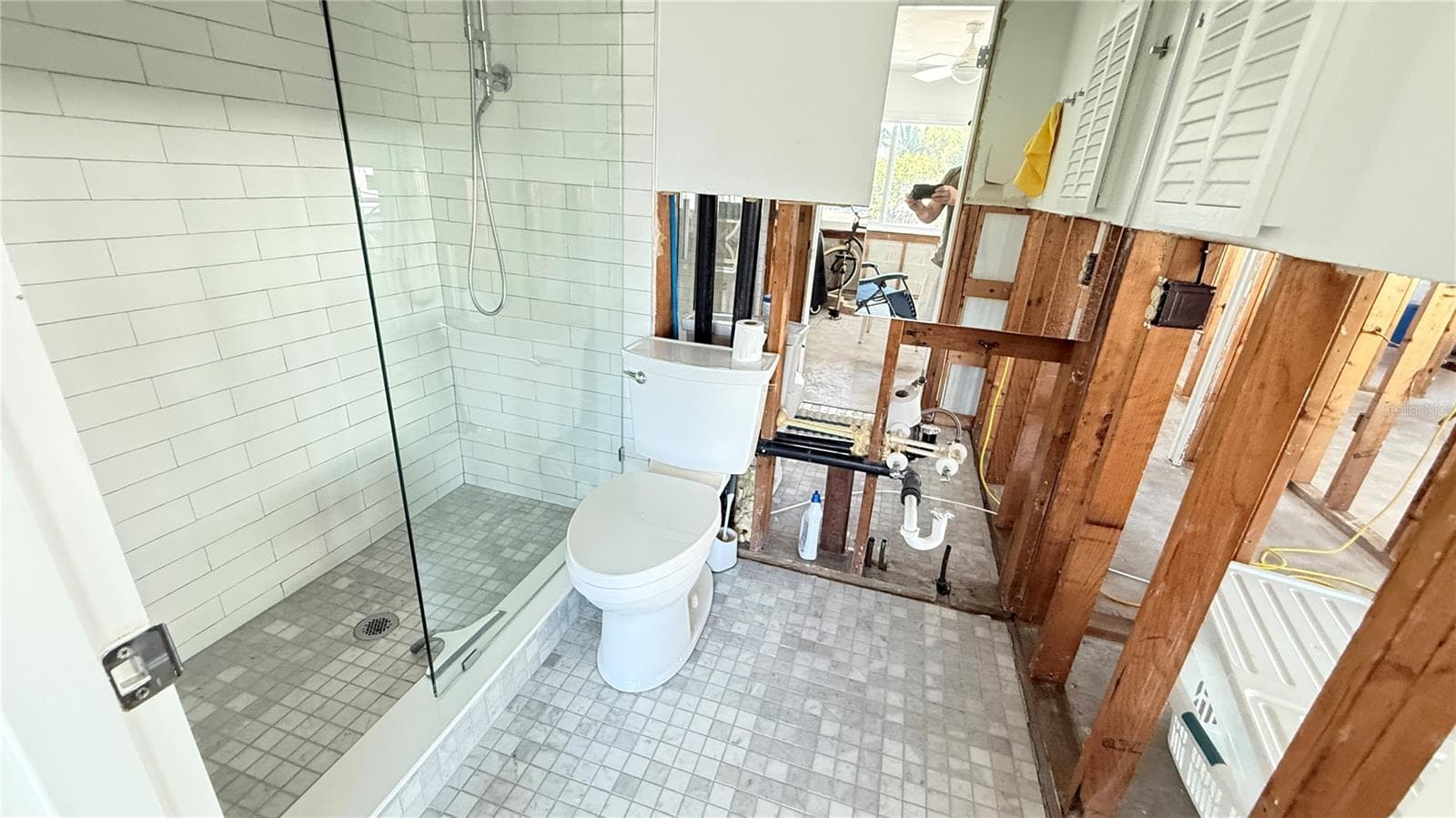 Canal side ensuite bathroom. Bathroom was remodeled prior to the storm. - 420 63RD ST #420A, HOLMES BEACH