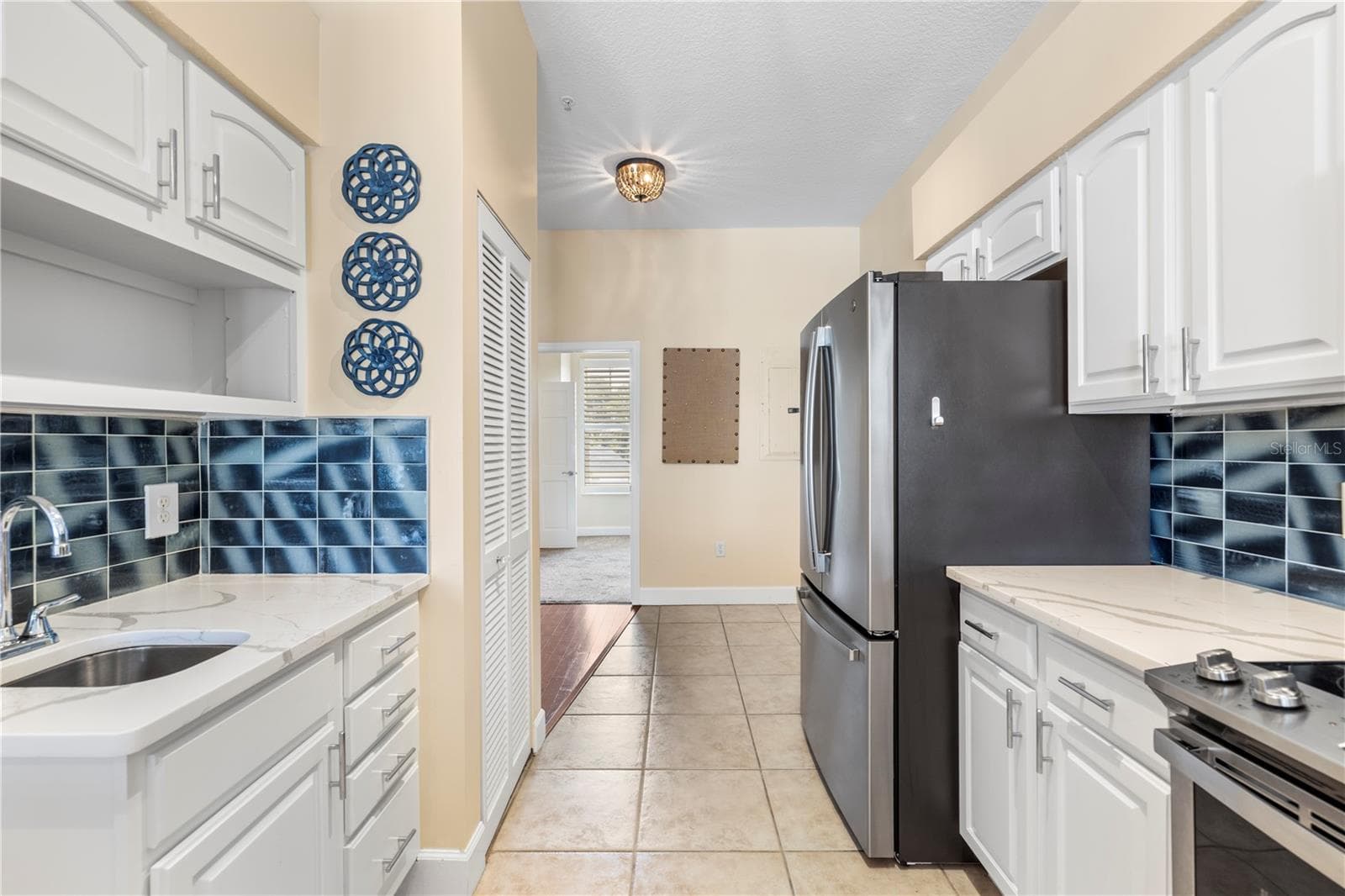 Kitchen - Granite & Stainless - 116 131ST AVE E #F, MADEIRA BEACH