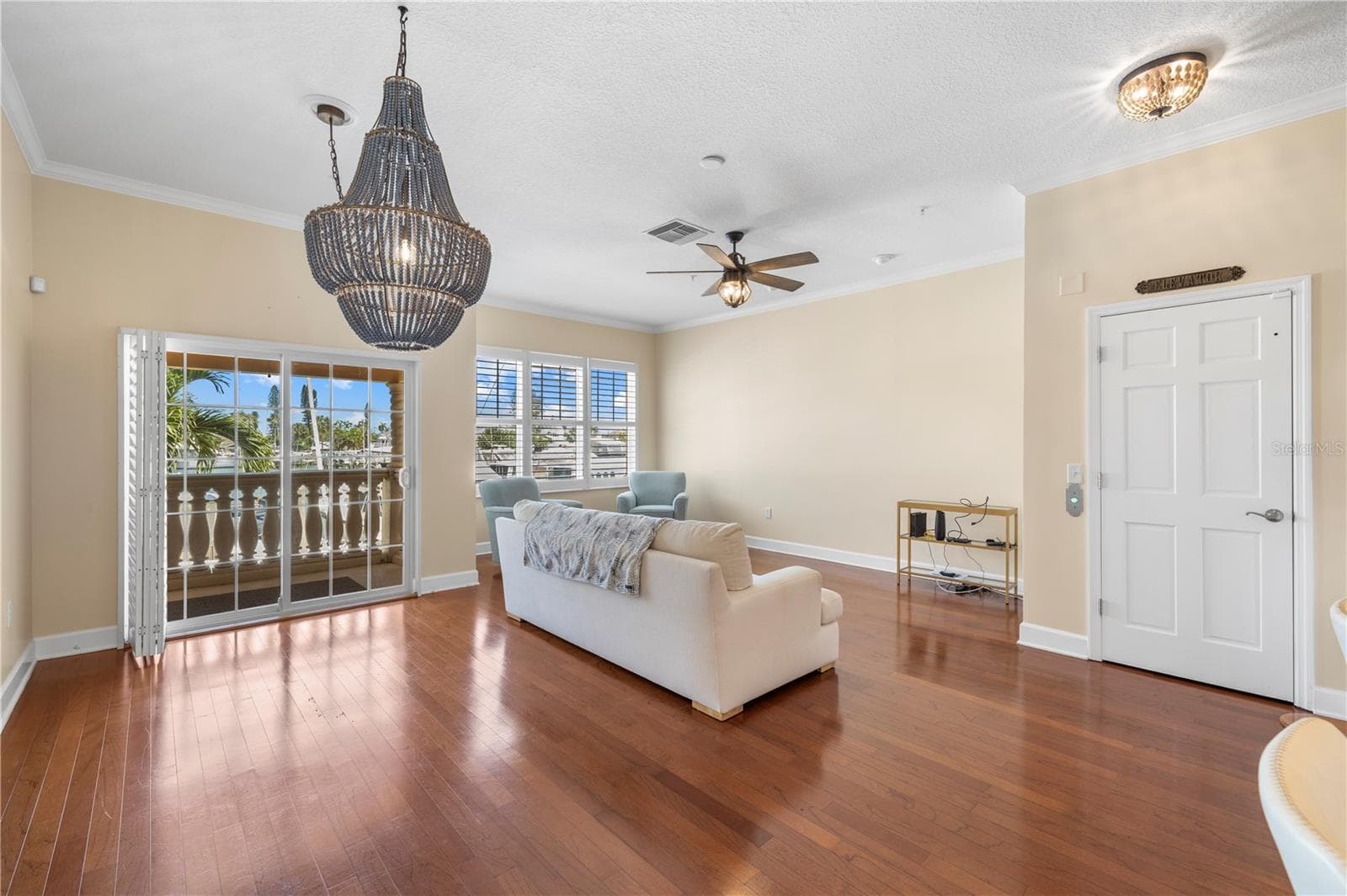 Living room + view - 116 131ST AVE E #F, MADEIRA BEACH
