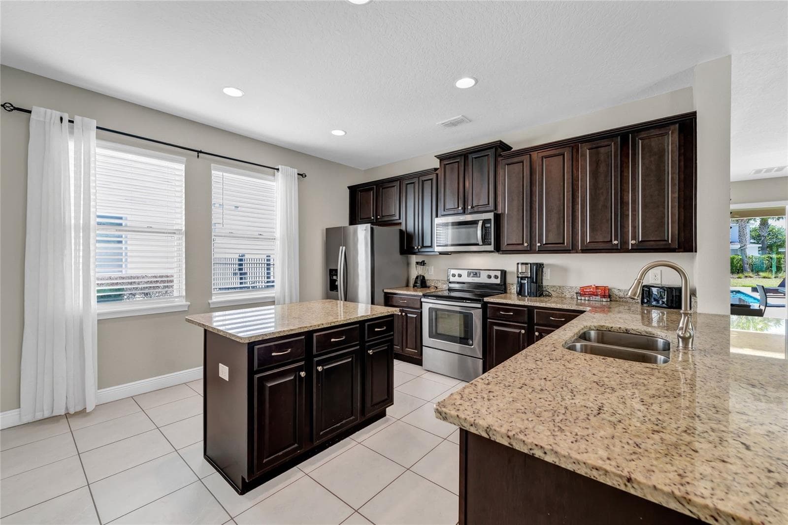 Single Family Residence at 7708 GRABEN ST, KISSIMMEE, photo 9 of 57