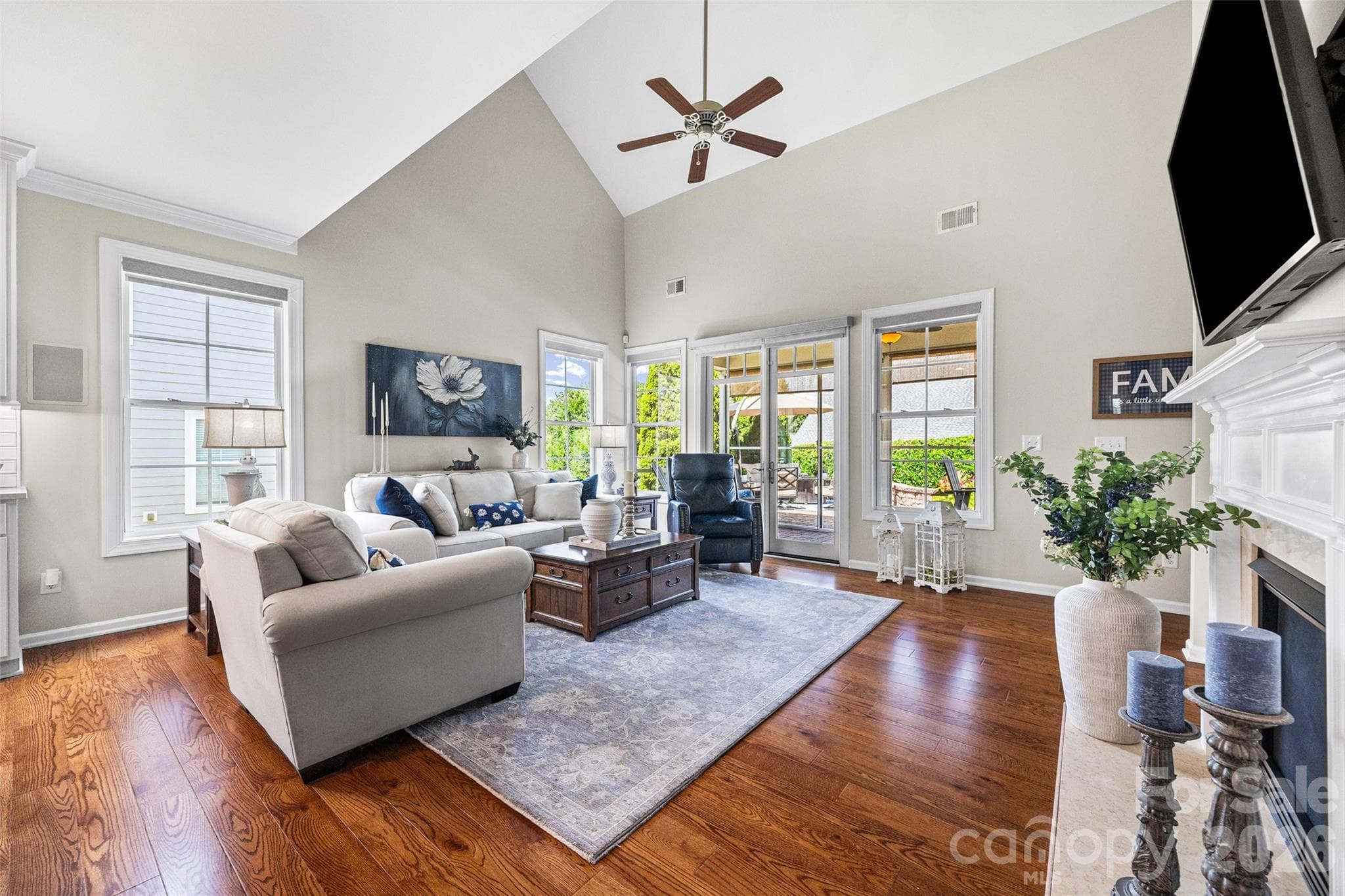 Generous-sized, vaulted great room with gas log fireplace. - 8621 Sequoia Grove Lane, Charlotte