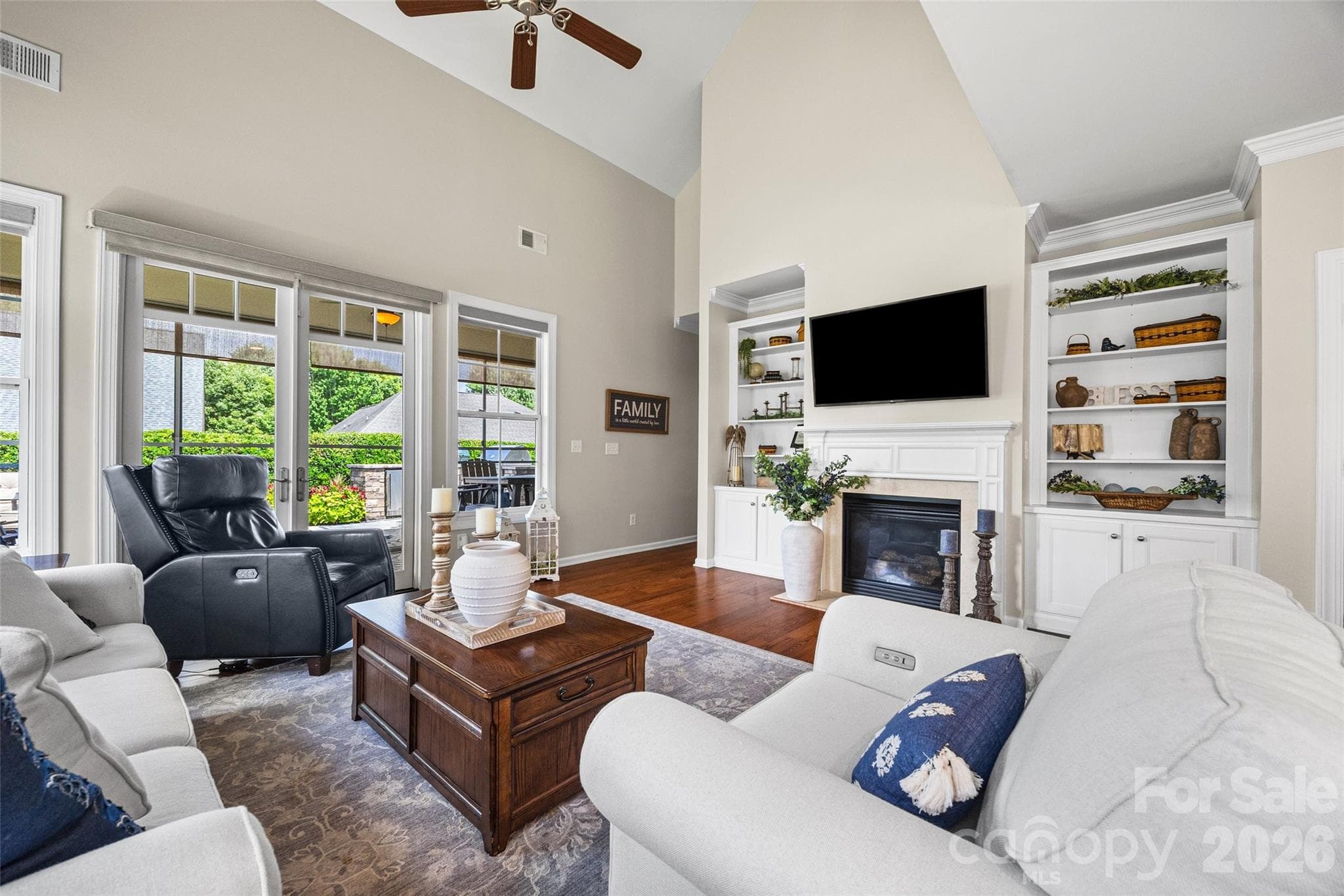 Detailed built-ins and fireplace mantel. - 8621 Sequoia Grove Lane, Charlotte
