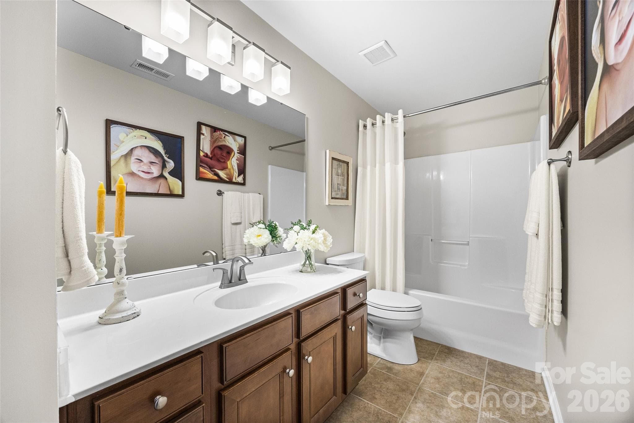 Upstairs full bath that connects to loft area and guest bedroom #2. - 8621 Sequoia Grove Lane, Charlotte