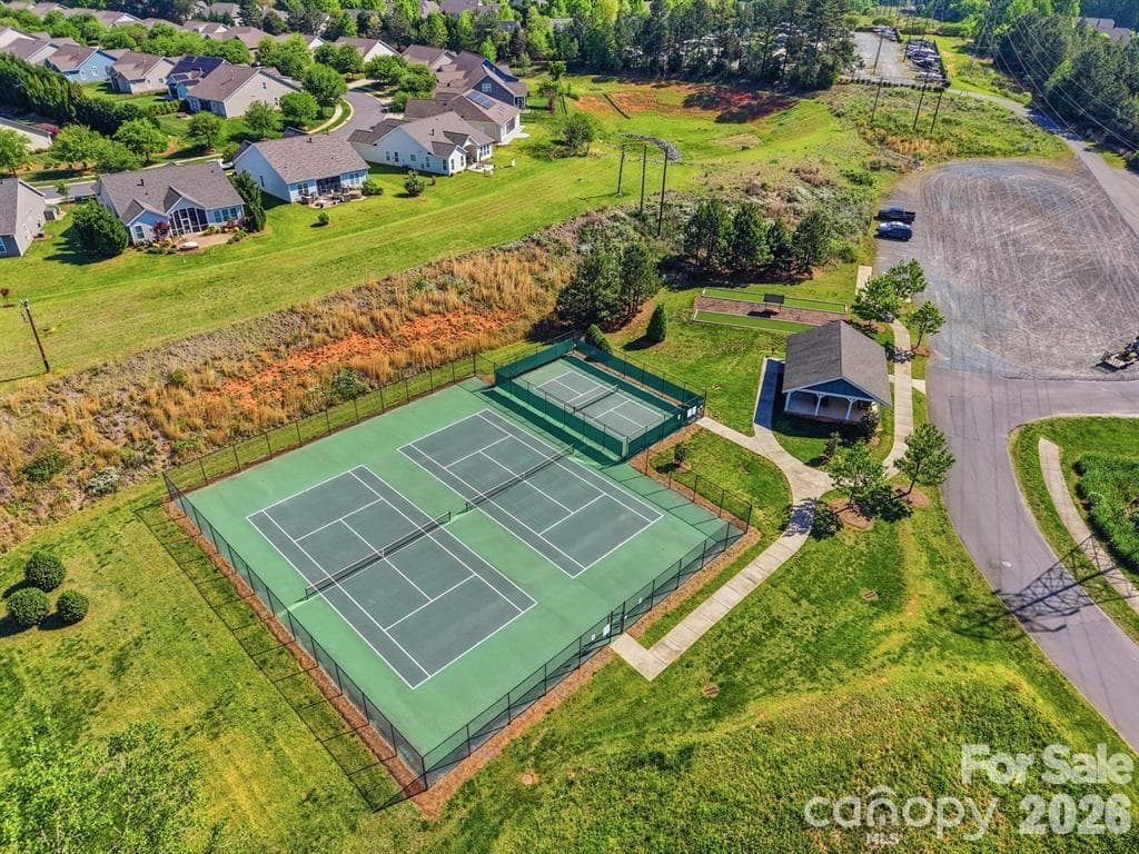 Tennis and pickleball courts, along with a picnic pavilion and two bocce courts. - 8621 Sequoia Grove Lane, Charlotte