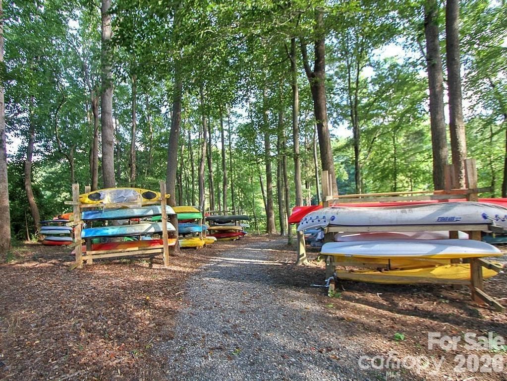 Kayak and canoe storage down by the lake. - 8621 Sequoia Grove Lane, Charlotte
