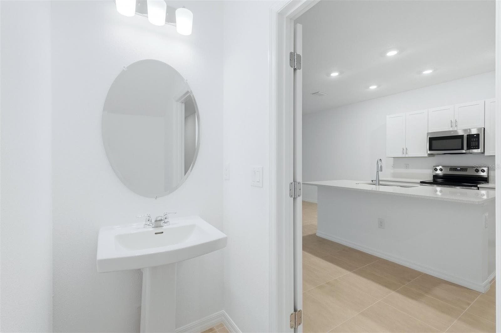 First Floor 1/2 Bath - 8417 LUNAR SKYE ST, SARASOTA