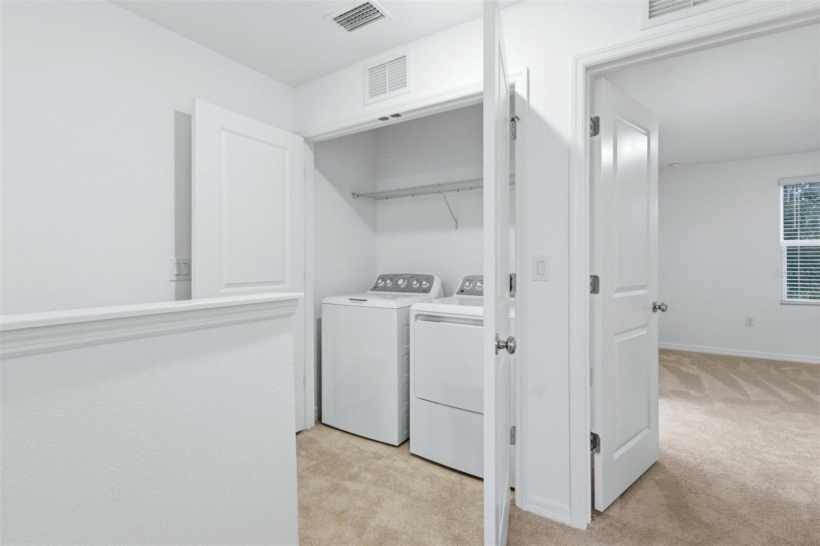 Upstairs Utility Room - 8417 LUNAR SKYE ST, SARASOTA