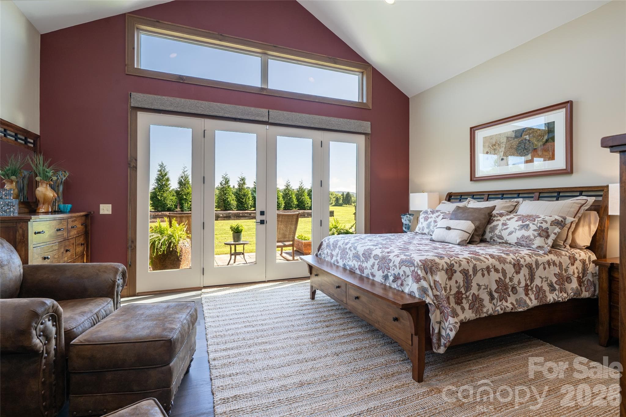 Primary suite with soaring cathedral ceilings and a beautiful long range view. - 660 Pleasant Grove Road, Hendersonville
