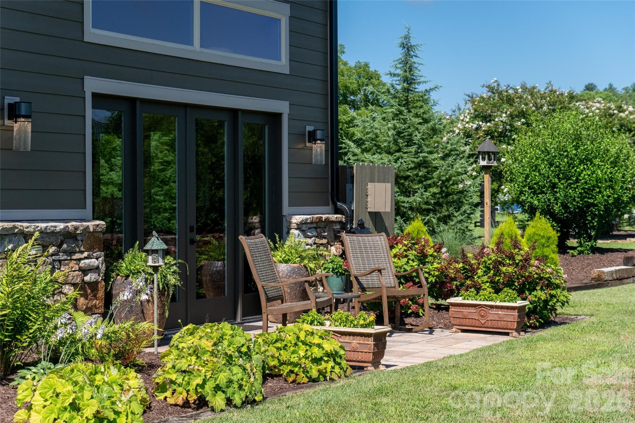 Patio off primary bedroom. - 660 Pleasant Grove Road, Hendersonville
