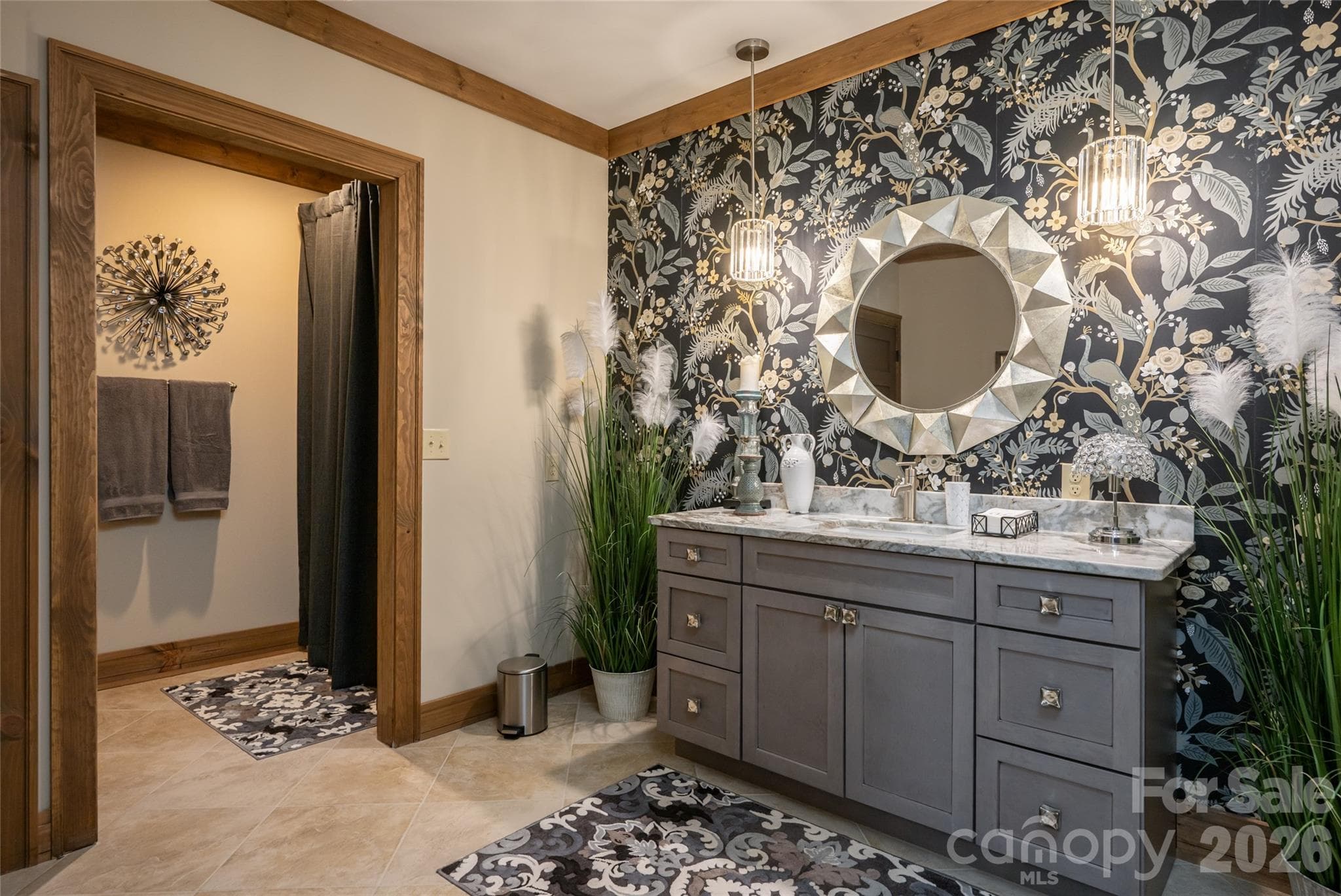 Spacious guest bathroom with tub/shower combination and private toilet room. - 660 Pleasant Grove Road, Hendersonville