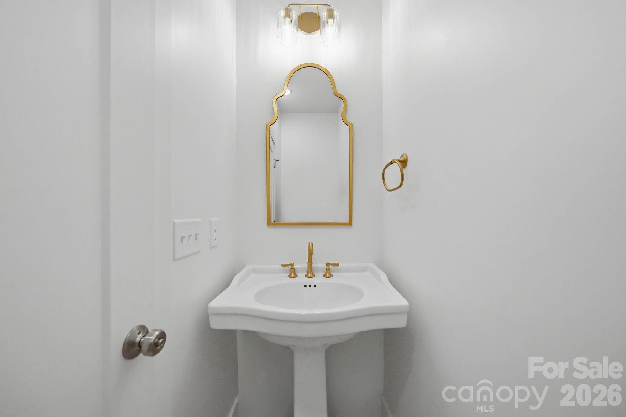 Powder room. - 2311 Chateau Court, Matthews