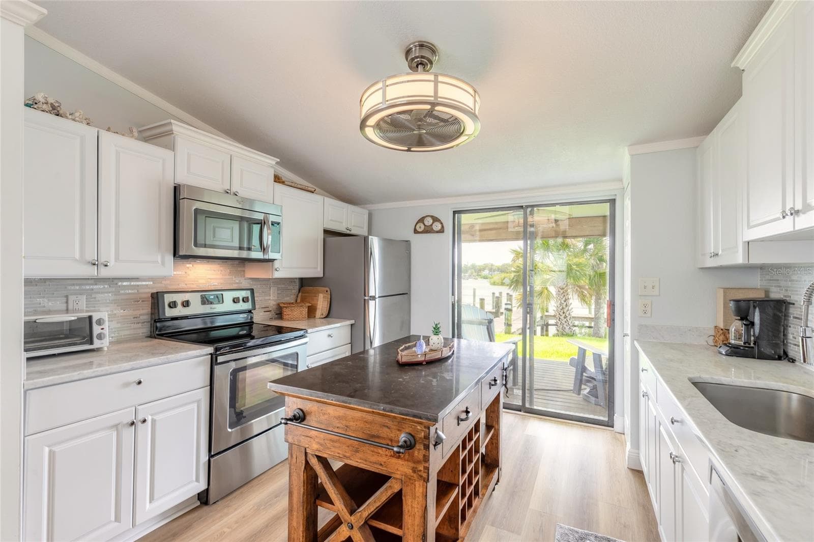 Kitchen galley island - 76 HEATHER POINT CT, NEW SMYRNA BEACH