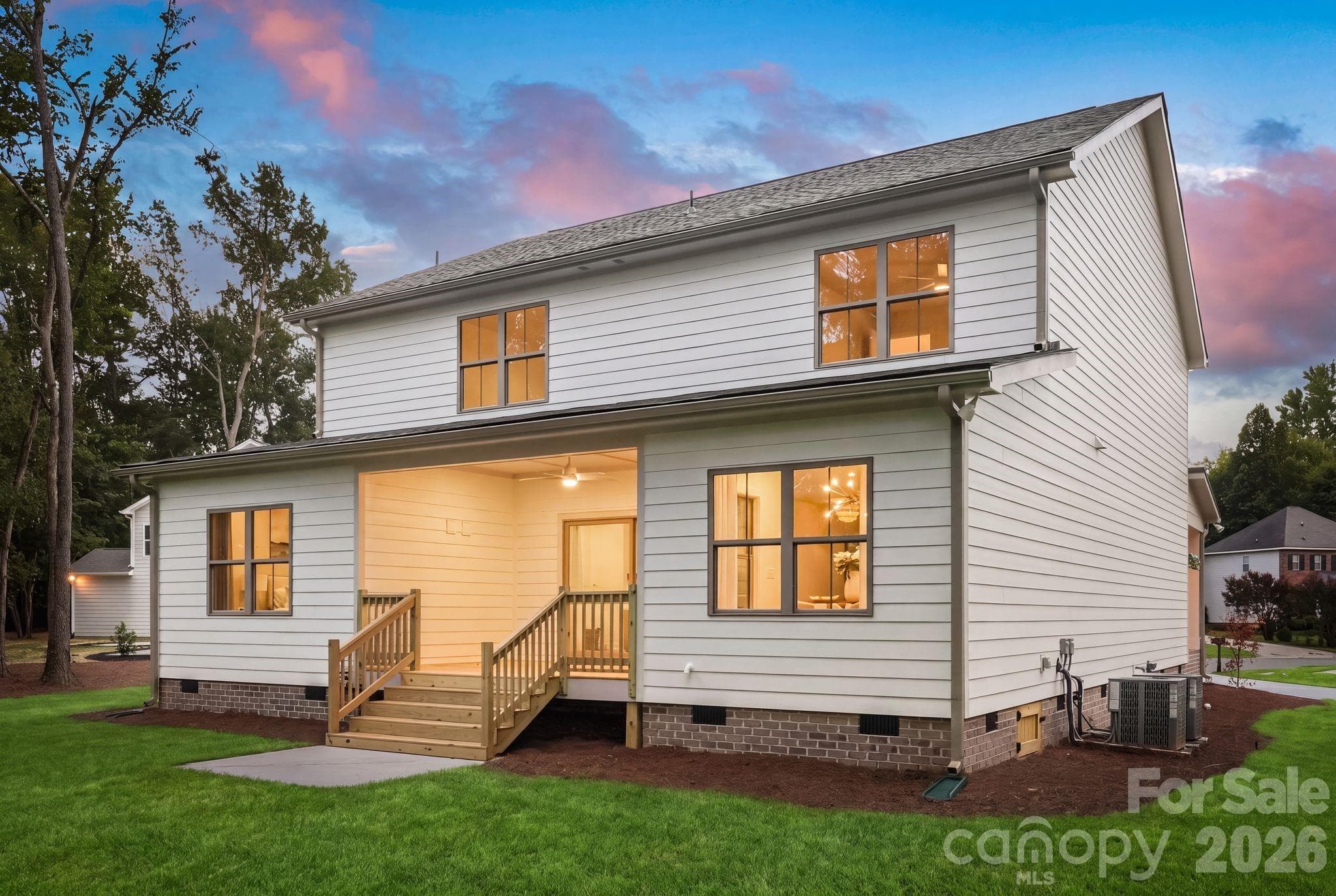 Exterior side view at twilight. - 2315 Chateau Court, Matthews